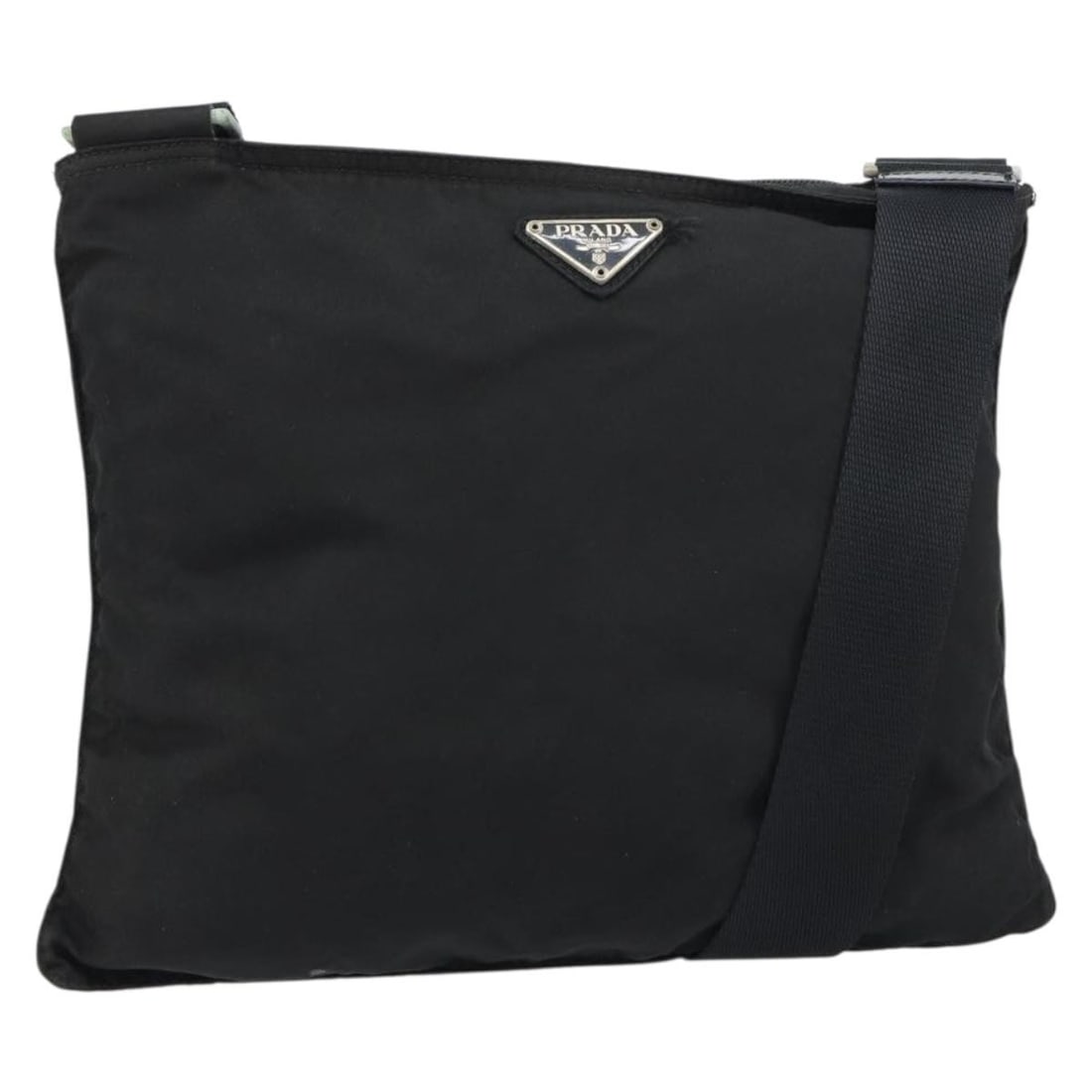 Prada Black Nylon Shoulder Bag with Silver Details Made in Italy: Prada Black Nylon Shoulder Bag with Silver Details Made in Italy This PRADA shoulder bag is crafted from black nylon with silver-tone accents. Made in Italy, it features an adjustable strap and a spac