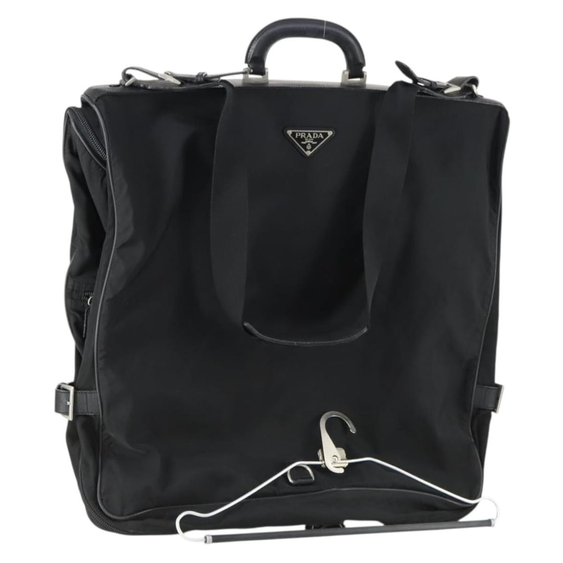Black Nylon Garment Cover by Prada with Silver Accents: Black Nylon Garment Cover by Prada with Silver Accents This is a PRADA garment cover crafted from black and silver nylon. Designed for travel or storage, it features both a shoulder strap and handles
