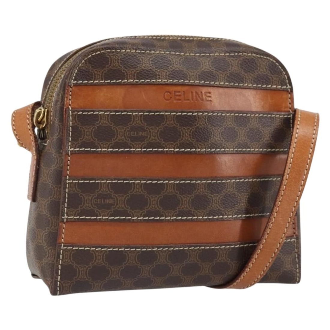 Celine Shoulder Bag Macadam Canvas Brown PVC Leather Gold-Tone Italy: Celine Shoulder Bag Macadam Canvas Brown PVC Leather Gold-Tone Italy This CELINE shoulder bag features the signature Macadam canvas with brown and gold accents and is crafted from PVC leather. The bag