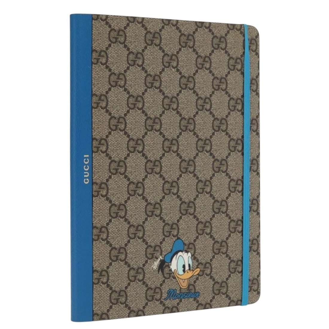Beige Gucci GG Supreme Note Cover Featuring Disney Donald Duck Design: Beige Gucci GG Supreme Note Cover Featuring Disney Donald Duck Design This Gucci GG Supreme note cover features a collaboration design with Disney's Donald Duck. Crafted in beige PVC leather and GG ca
