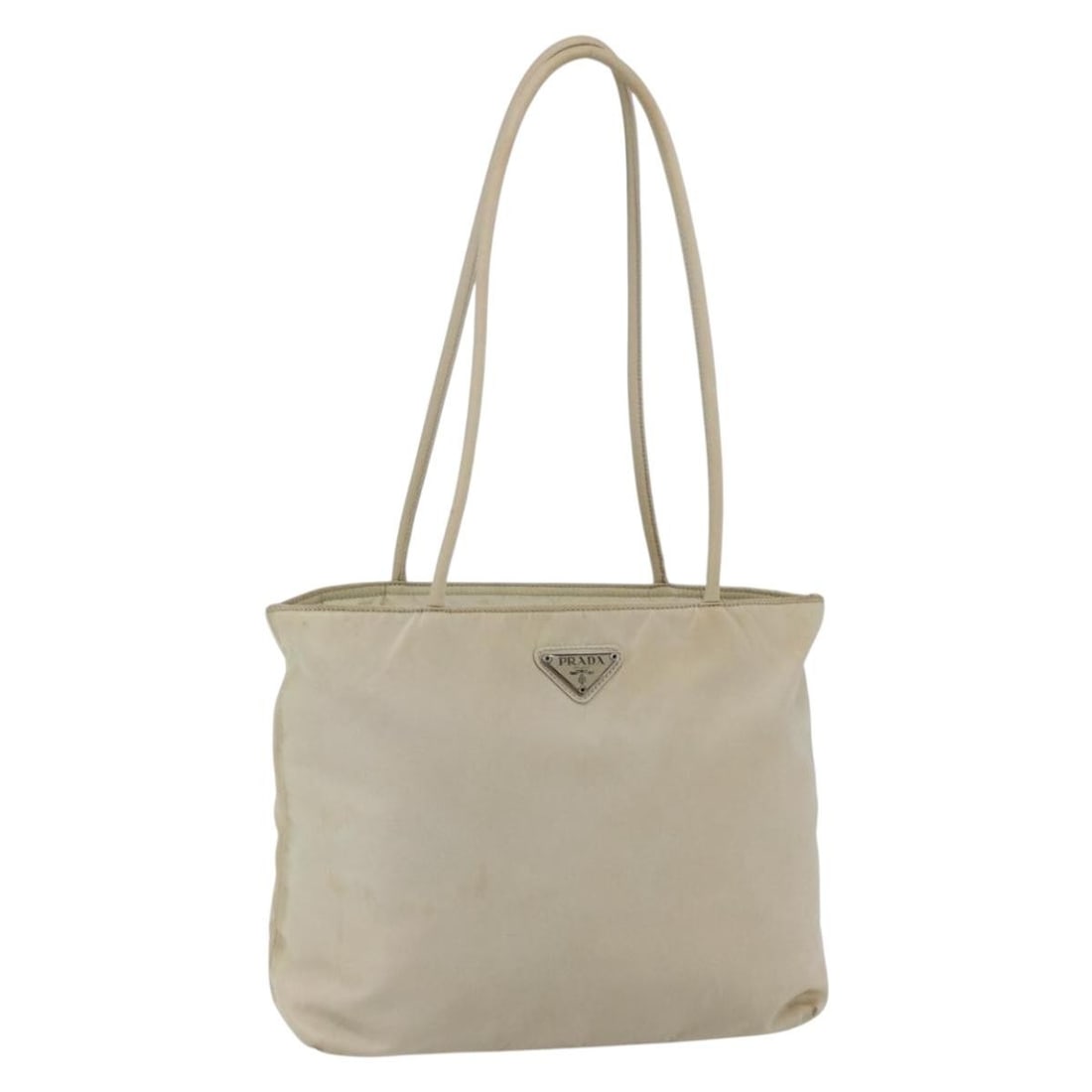 PRADA Nylon Tote Bag Ivory Silver Auth 147951 Made in Italy: PRADA Nylon Tote Bag Ivory Silver Auth 147951 Made in Italy This PRADA Tote Bag is a stylish accessory crafted from durable nylon, featuring a chic ivory and silver color scheme. With dimensions of ap