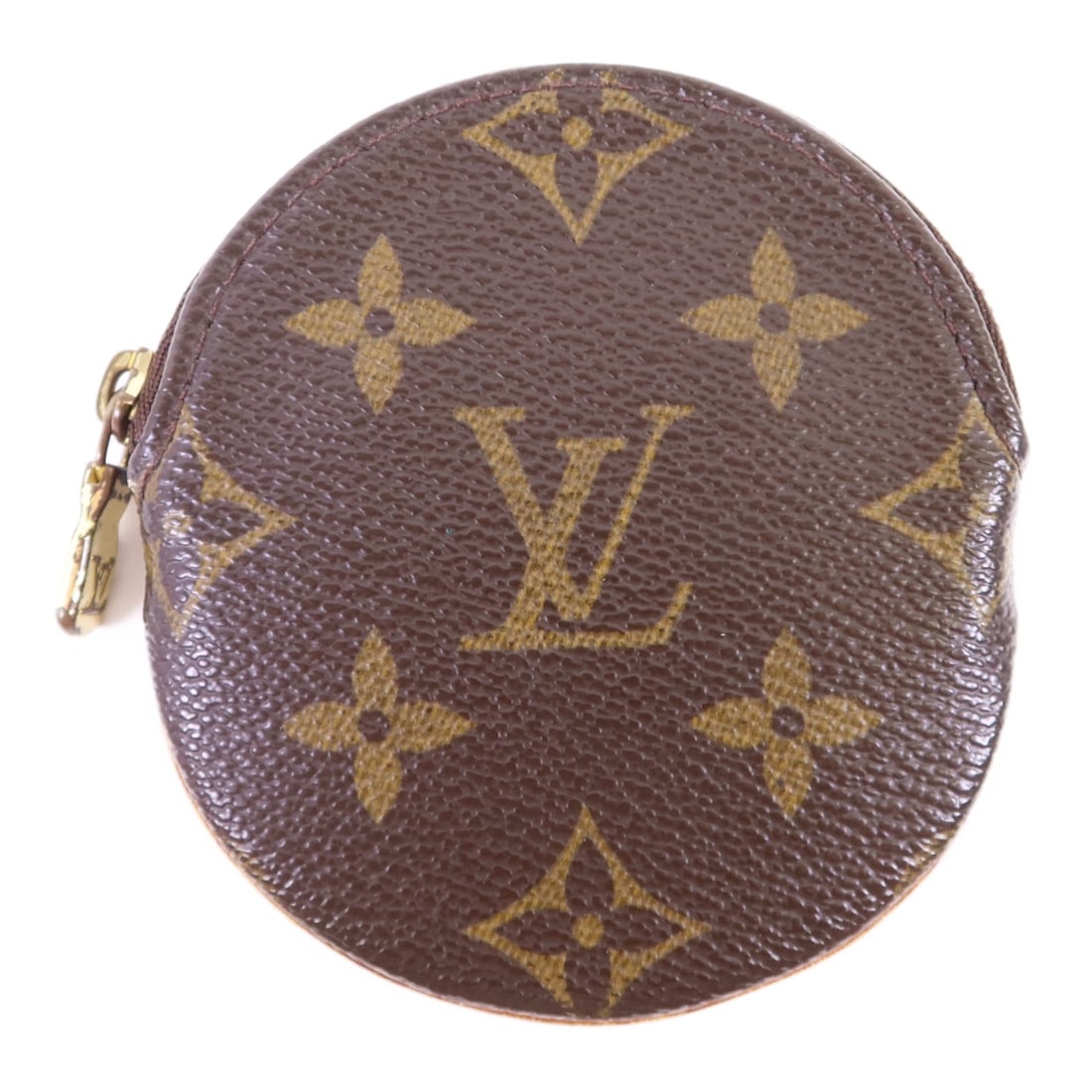Monogram Brown Louis Vuitton M61926 Canvas Coin Purse: Monogram Brown Louis Vuitton M61926 Canvas Coin Purse Louis Vuitton coin purse crafted from PVC coated canvas in the signature brown Monogram pattern. This compact accessory is designed for organizing