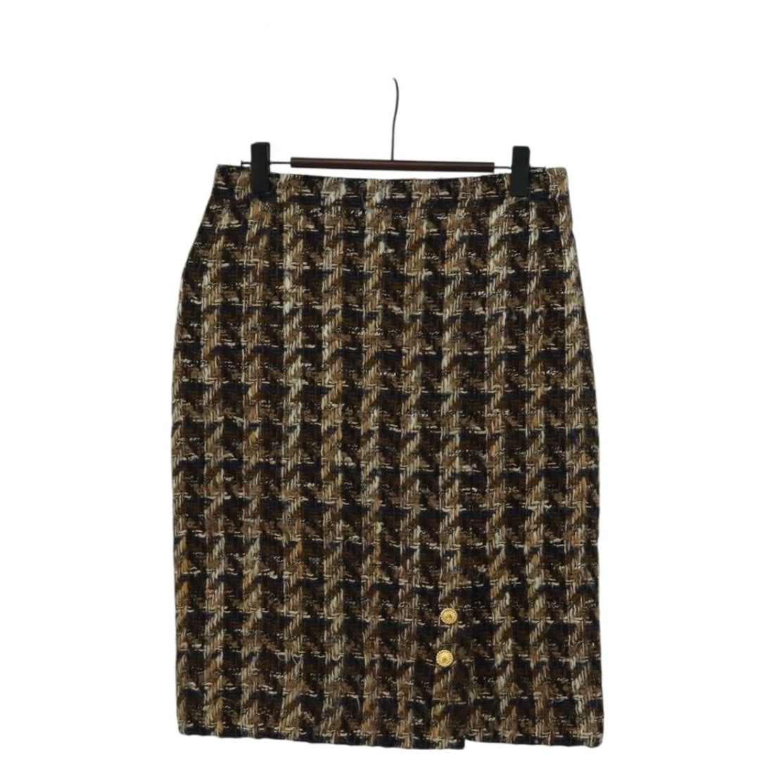 Black Canvas Skirt by CHANEL with CC Detail: Black Canvas Skirt by CHANEL with CC Detail This CHANEL skirt features a classic black tweed design crafted from canvas material. Made in France, it is styled with a shaft height of approximately 53 c