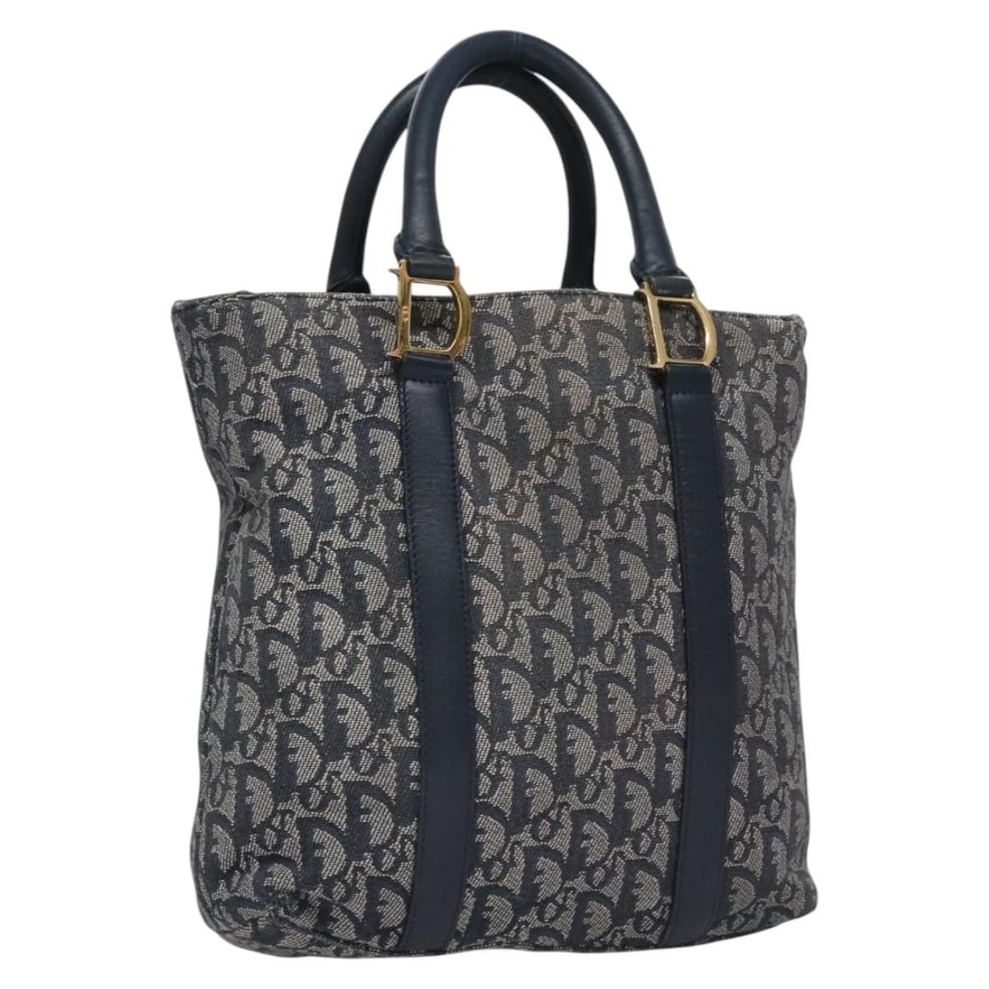 Christian Dior Navy Gold Trotter Canvas Hand Bag Made in Italy: Christian Dior Navy Gold Trotter Canvas Hand Bag Made in Italy This Christian Dior Trotter Canvas Hand Bag is a stylish accessory that embodies luxury and sophistication. Crafted from durable canvas i