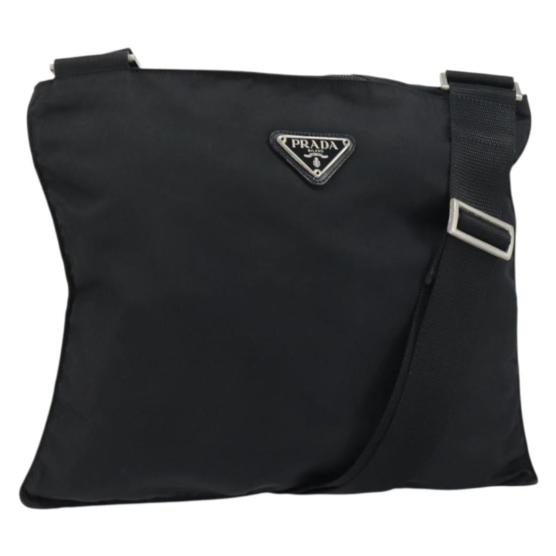 Prada Black and Silver Nylon Italian Shoulder Bag: Prada Black and Silver Nylon Italian Shoulder Bag This PRADA shoulder bag features a silver and black nylon exterior, offering a sleek and versatile design. Made in Italy, the bag is equipped with an
