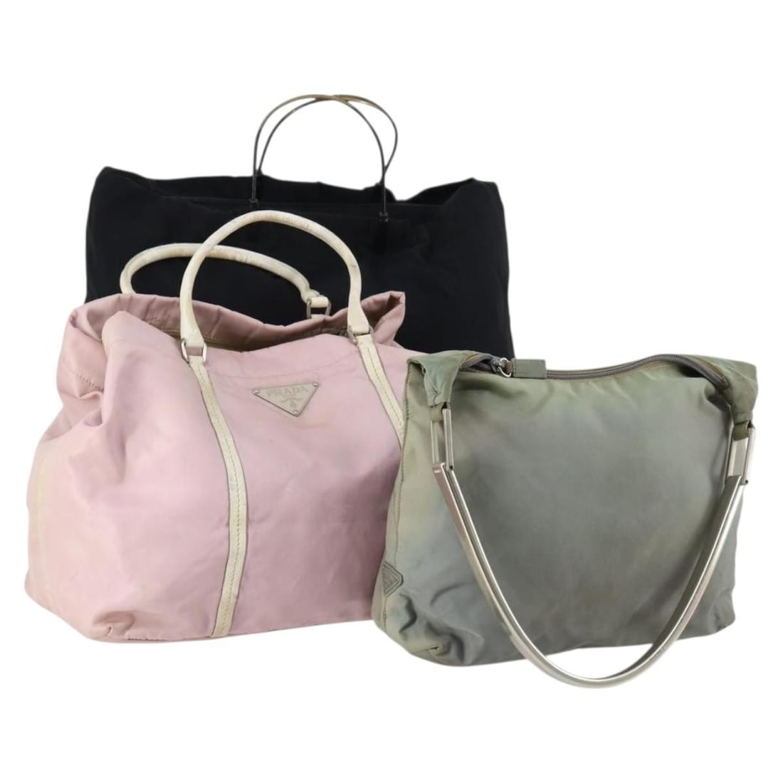 PRADA Nylon Hand Bag Set Black Green Pink Authentic: PRADA Nylon Hand Bag Set Black Green Pink Authentic This authentic PRADA hand bag set features a stylish combination of black, green, and pink nylon. Crafted in Italy, this set includes three bags, ea