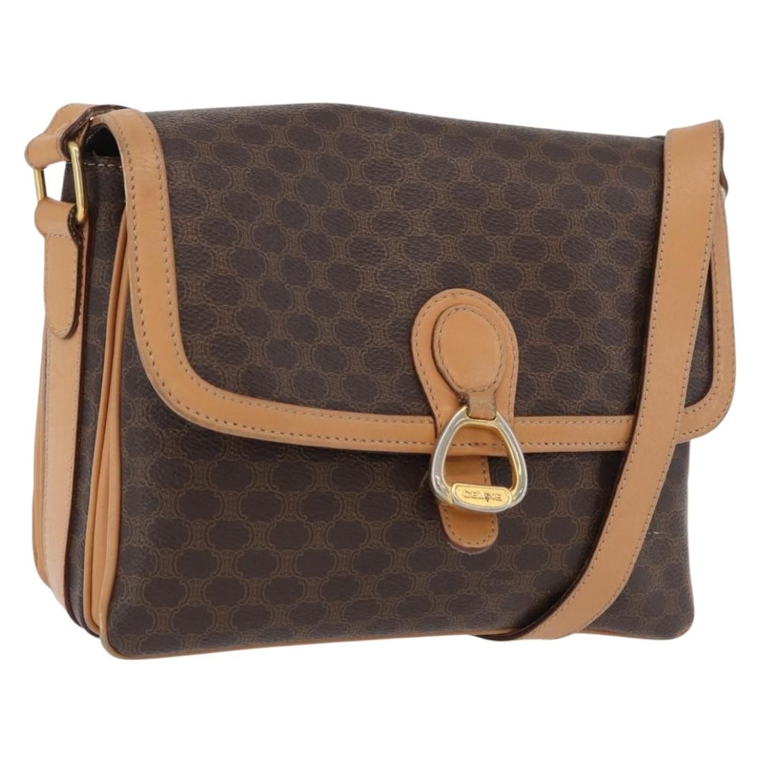 Macadam Canvas Shoulder Bag by CELINE Brown PVC Leather Gold-Tone Trim: Macadam Canvas Shoulder Bag by CELINE Brown PVC Leather Gold-Tone Trim This is a CELINE Macadam canvas shoulder bag crafted from brown PVC leather with gold-tone accents. The bag features a spacious i