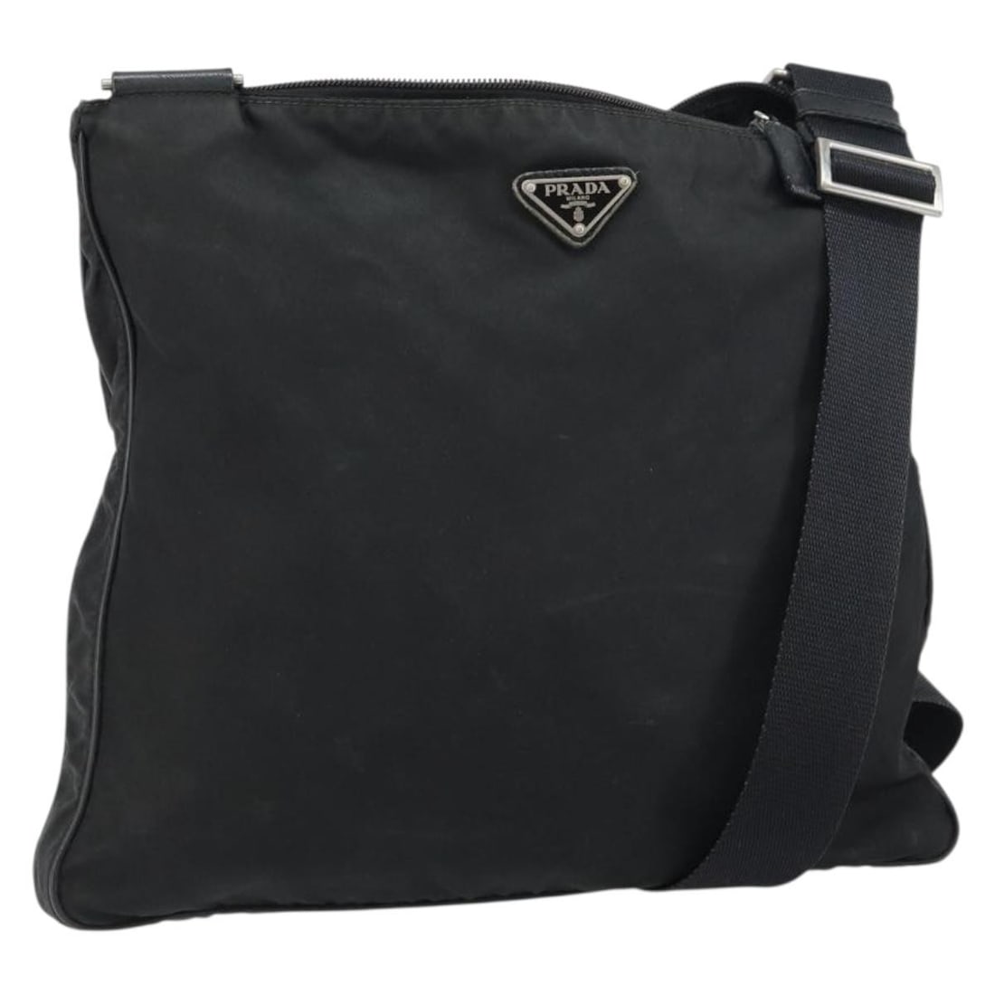 Prada Black Nylon Shoulder Bag with Silver Tone Accents Made in Italy: Prada Black Nylon Shoulder Bag with Silver Tone Accents Made in Italy This PRADA shoulder bag features a black nylon exterior with silver-tone accents. The bag offers a spacious main compartment and a