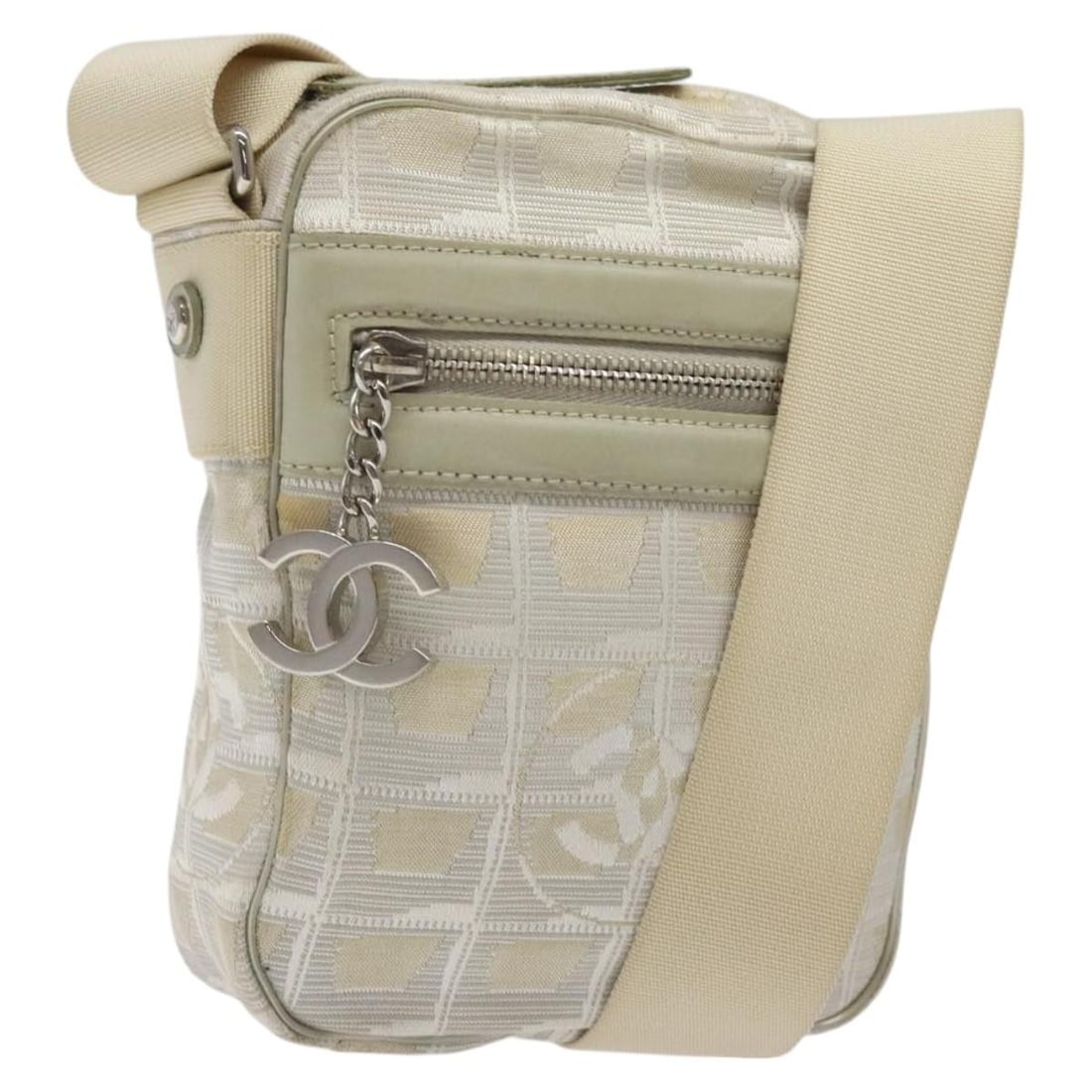 CHANEL New Travel Line White Canvas Shoulder Bag with Silver CC: CHANEL New Travel Line White Canvas Shoulder Bag with Silver CC This CHANEL New Travel Line Shoulder Bag is a stylish accessory crafted from durable canvas in a sophisticated white and silver color sc