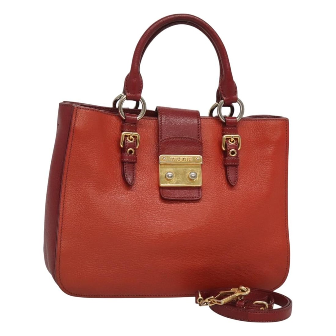 Miu Miu Leather Hand Bag Red Gold Made in Italy: Miu Miu Leather Hand Bag Red Gold Made in Italy This stylish Miu Miu handbag features an elegant combination of red and gold leather, making it a standout accessory for any outfit. With a generous bag