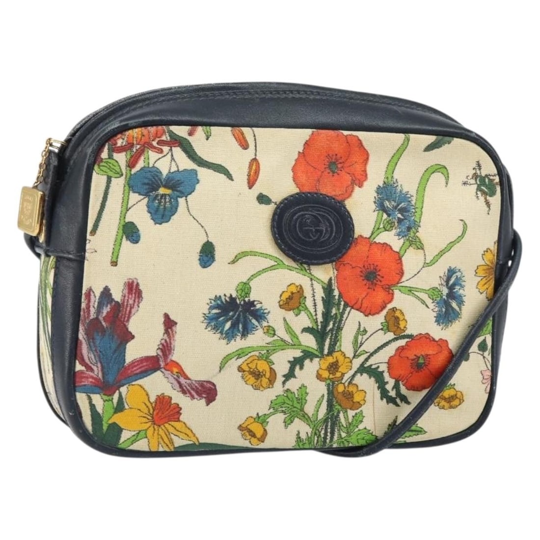 Gucci Canvas Multicolor Shoulder Bag 007 113 0068 Made in Italy: Gucci Canvas Multicolor Shoulder Bag 007 113 0068 Made in Italy This Gucci shoulder bag features a multicolor canvas exterior and is crafted in Italy. The bag has a compact design with an approximate