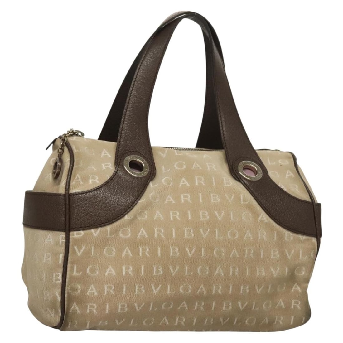 BVLGARI Logo Mania Beige Gold Canvas Hand Bag Made in Italy: BVLGARI Logo Mania Beige Gold Canvas Hand Bag Made in Italy The BVLGARI Logo Mania Hand Bag is a stylish accessory crafted from durable canvas in a sophisticated beige and gold color scheme. This hand