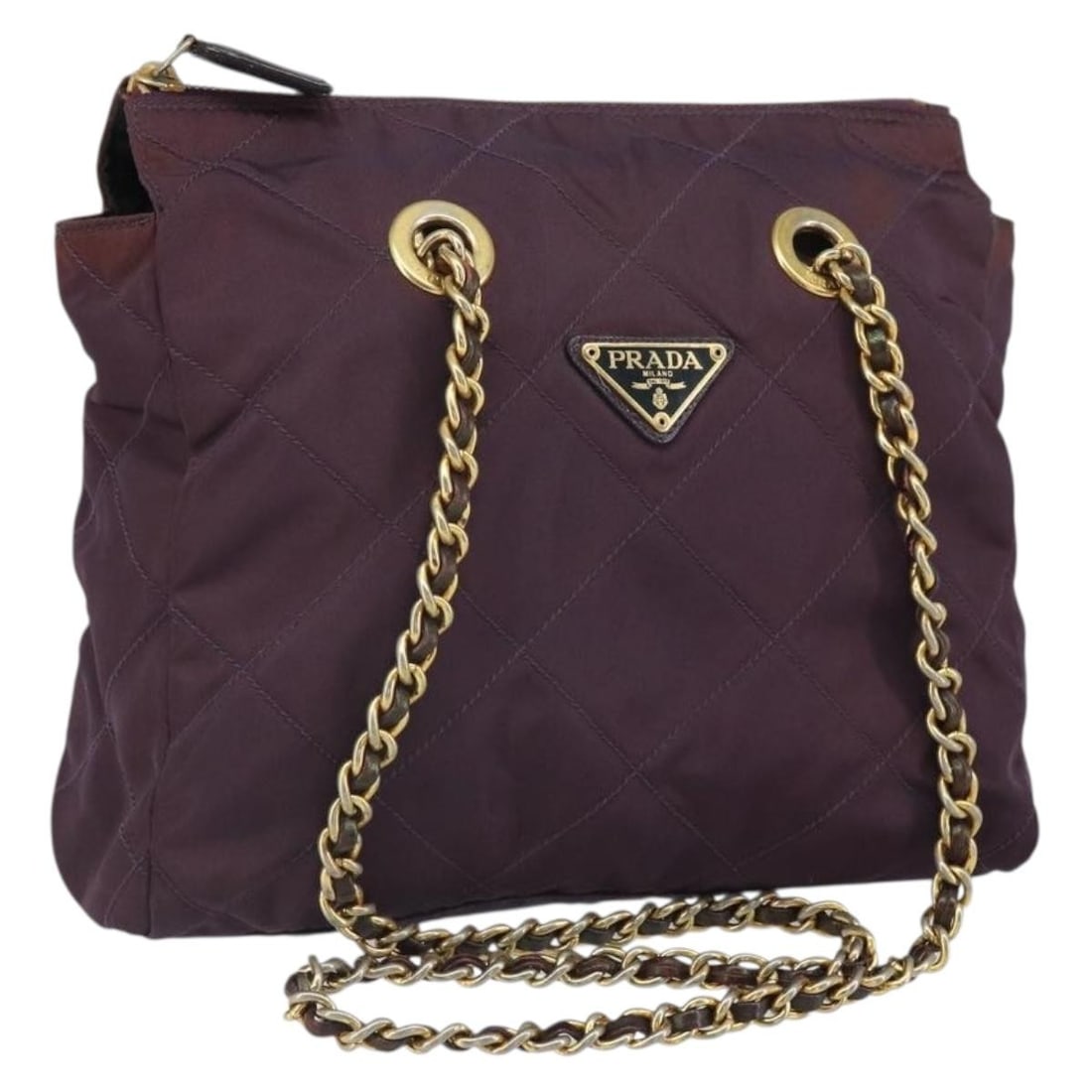 Purple Nylon Quilted Chain Shoulder Bag by Prada with Gold Tone Details: Purple Nylon Quilted Chain Shoulder Bag by Prada with Gold Tone Details This PRADA chain quilted shoulder bag is crafted from purple nylon with gold-tone accents. Made in Italy, it features a quilted