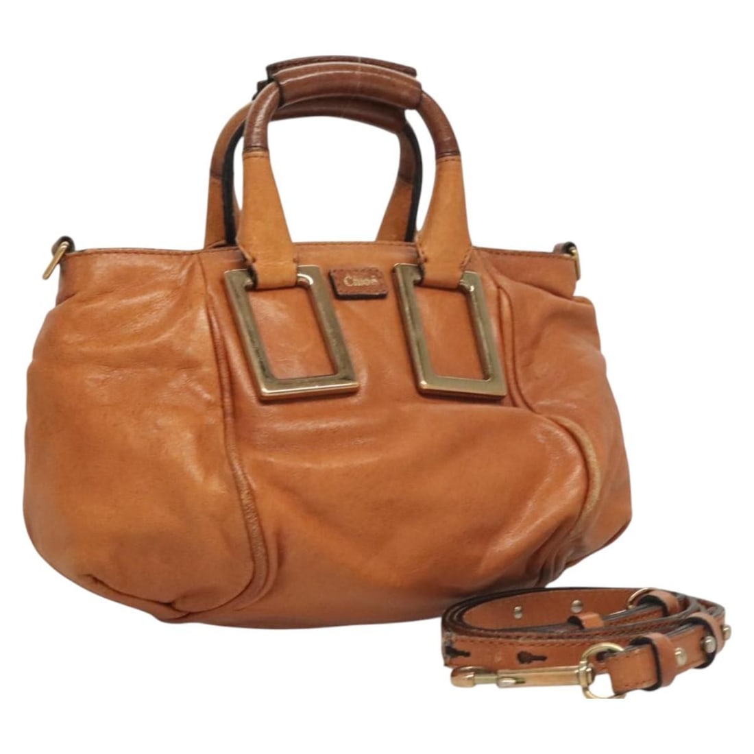 Chloe Etel Brown Leather Convertible Handbag with Gold Accents and Strap: Chloe Etel Brown Leather Convertible Handbag with Gold Accents and Strap This Chloe Etel 2-way handbag is crafted from brown and gold leather and offers both hand and shoulder carrying options with it