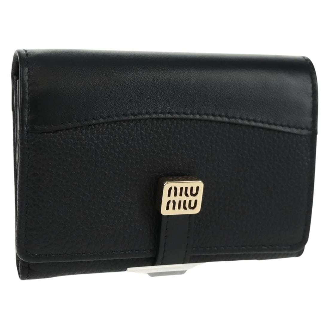 Leather Compact Wallet by Miu Miu Black Italian Made: Leather Compact Wallet by Miu Miu Black Italian Made This Miu Miu compact wallet features black leather construction and an elegant, minimalist design. Made in Italy, it offers a practical and stylish