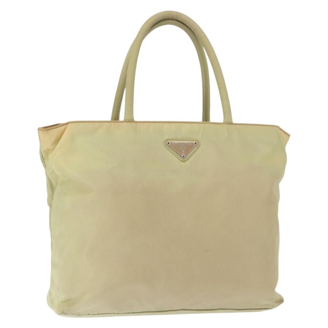 Ivory Nylon Tote by PRADA Italy Model 165498: Ivory Nylon Tote by PRADA Italy Model 165498 This Prada tote bag is crafted from ivory nylon and features a spacious design with dual handles. Made in Italy, it offers a versatile and functional acces