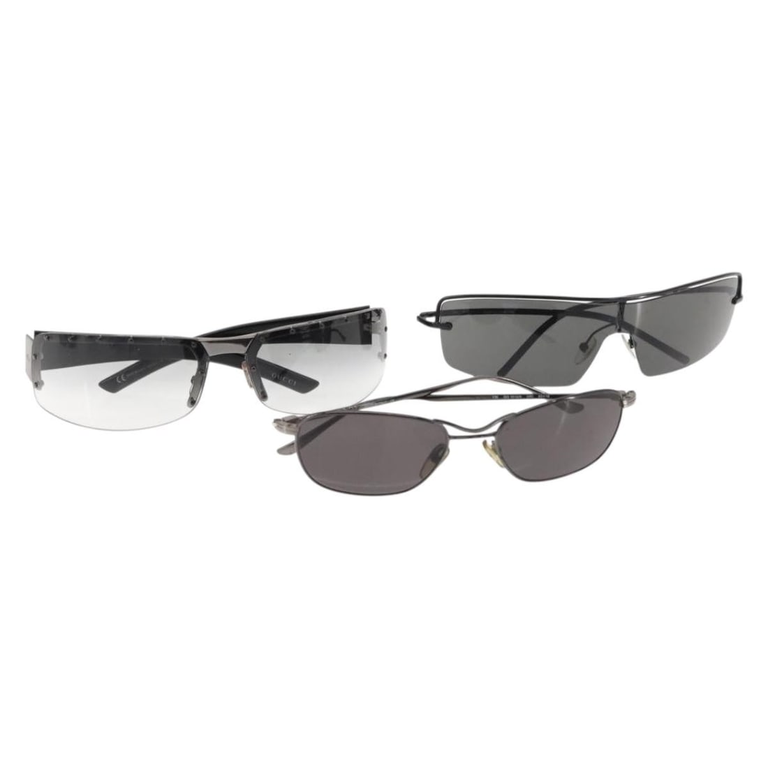 GUCCI Black Plastic Sunglasses Set of 3 Authentic: GUCCI Black Plastic Sunglasses Set of 3 Authentic Elevate your accessory collection with this GUCCI Sunglasses Set, a striking combination of style and practicality. Crafted from durable plastic, thes