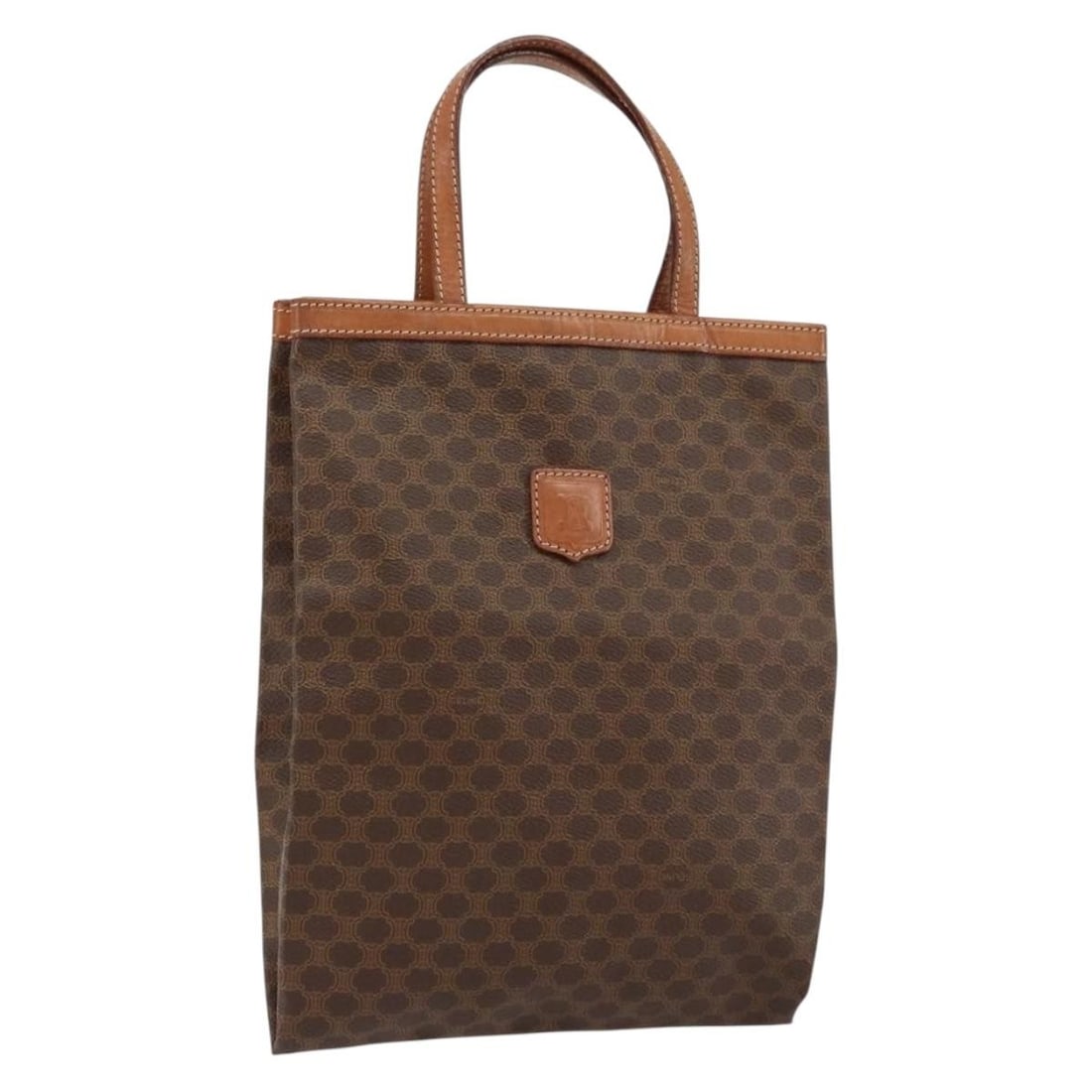 CELINE Macadam Canvas Brown Tote Bag PVC Italy Auth: CELINE Macadam Canvas Brown Tote Bag PVC Italy Auth This authentic CELINE Macadam Canvas Tote Bag is crafted in Italy, featuring a stylish brown PVC leather exterior. With an approximate height of 11.