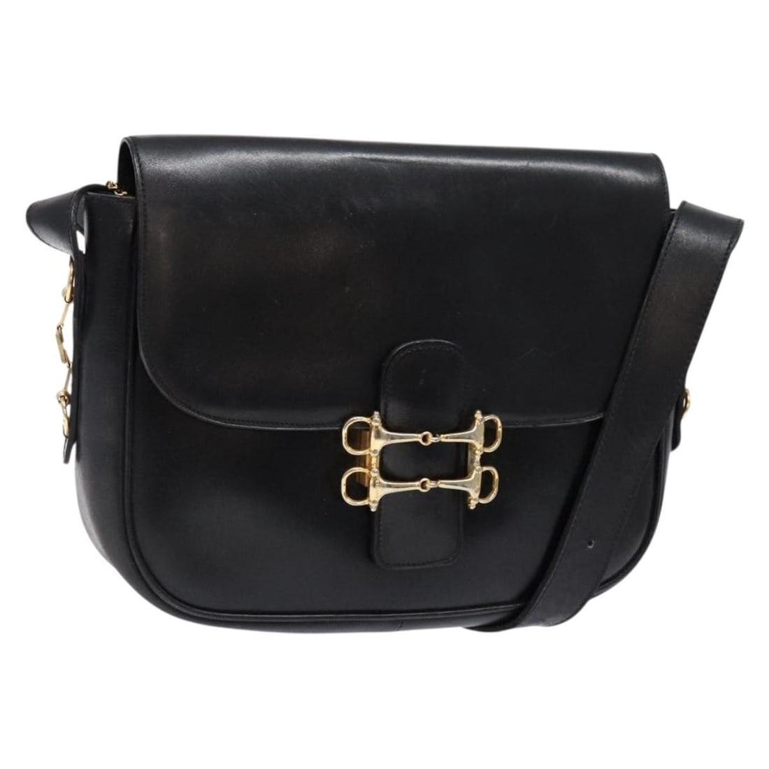 CELINE Black Gold Leather Shoulder Bag Made in Italy: CELINE Black Gold Leather Shoulder Bag Made in Italy This authentic CELINE shoulder bag is a stylish accessory crafted in Italy, featuring a chic black leather exterior with gold accents. The bag meas