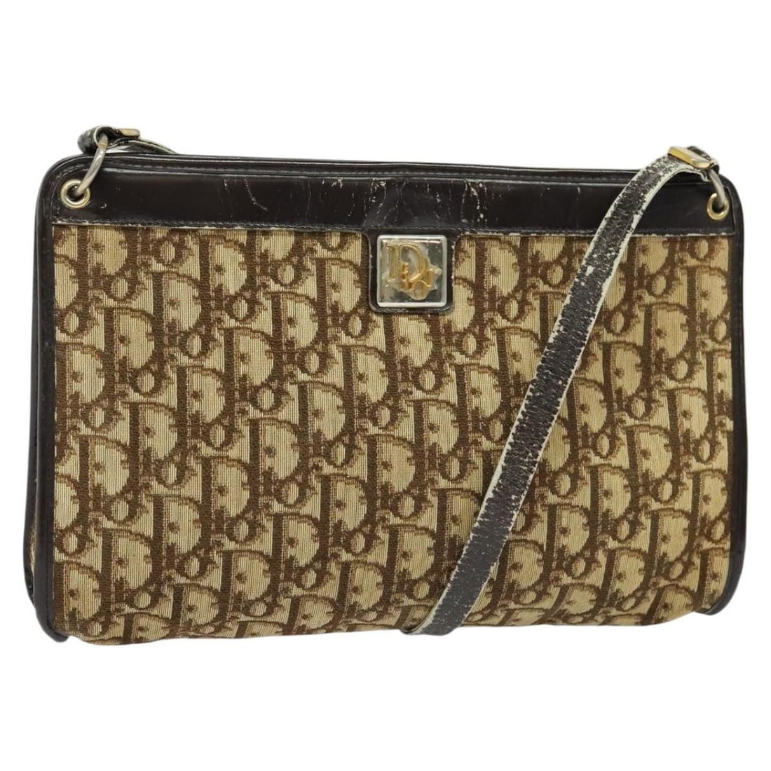 Authentic Christian Dior Beige Trotter Canvas Shoulder Bag: Authentic Christian Dior Beige Trotter Canvas Shoulder Bag This Christian Dior Trotter Canvas Shoulder Bag in beige is a stylish accessory that showcases the renowned Parisian craftsmanship. Made from