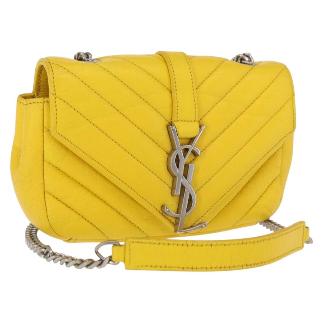 Yellow Leather Cassandra Shoulder Bag by Saint Laurent with Silver Chain: Yellow Leather Cassandra Shoulder Bag by Saint Laurent with Silver Chain This SAINT LAURENT Cassandra chain shoulder bag features a yellow leather exterior with silver-tone accents. The compact design