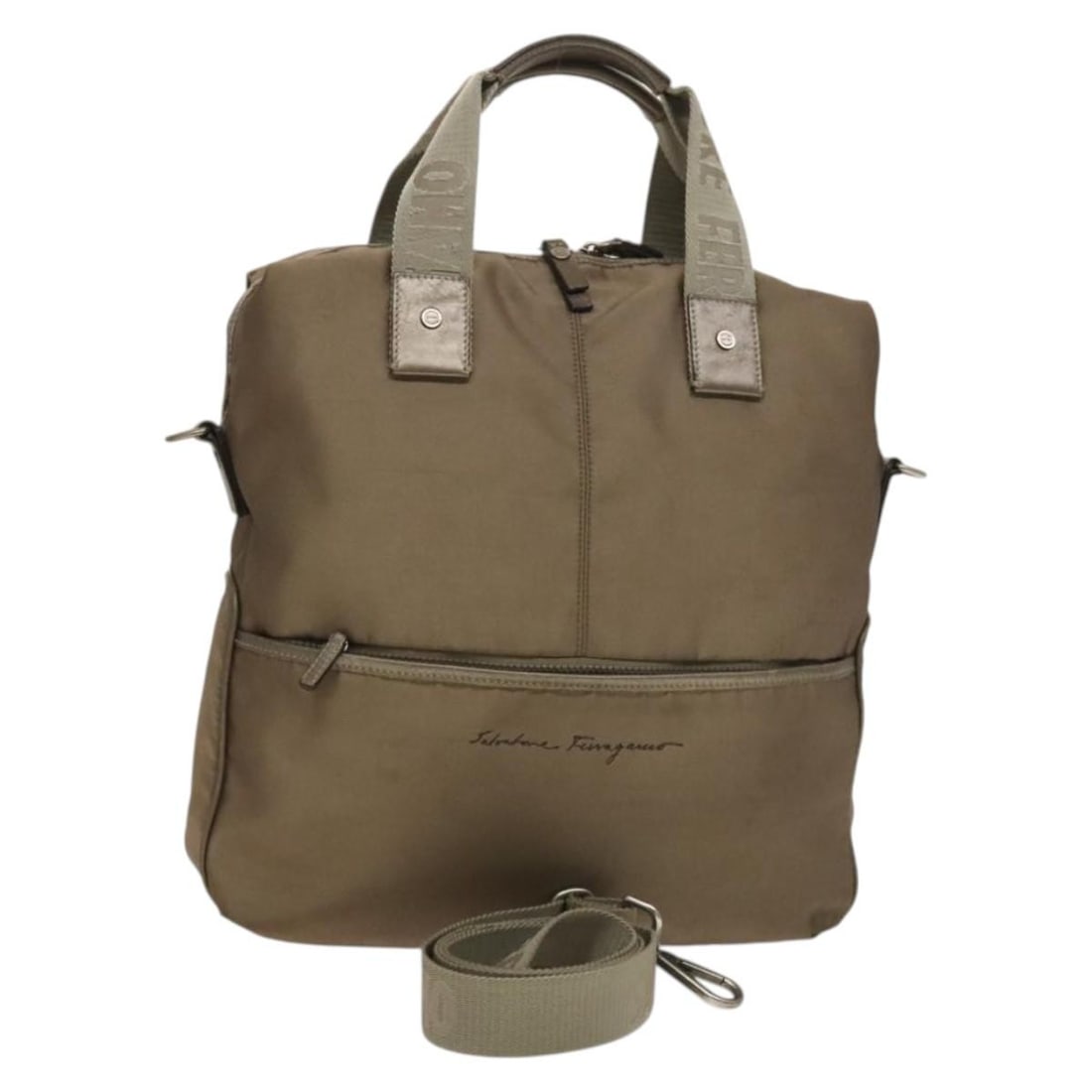 Salvatore Ferragamo Beige Silver Nylon Tote Bag 2way Made in Italy: Salvatore Ferragamo Beige Silver Nylon Tote Bag 2way Made in Italy This Salvatore Ferragamo Tote Bag is a stylish and practical accessory crafted from durable nylon. The bag features a sophisticated b