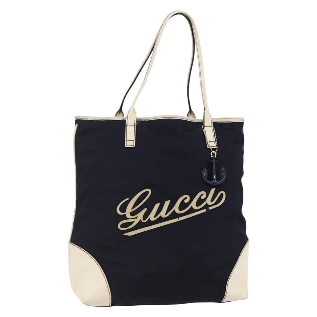 GUCCI Navy Nylon Tote Bag Italy 170008 Auth: GUCCI Navy Nylon Tote Bag Italy 170008 Auth This authentic GUCCI tote bag is crafted in Italy from durable nylon in a classic navy color. Its spacious design includes a height of approximately 14.2 in
