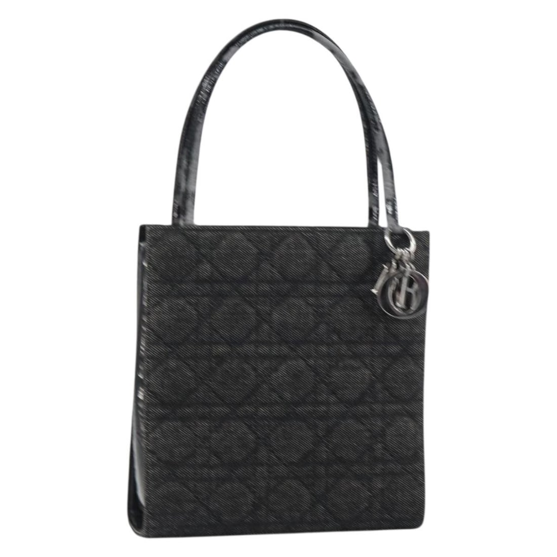 Lady Dior Black Denim Handbag by Christian Dior with Silver Tone Charm: Lady Dior Black Denim Handbag by Christian Dior with Silver Tone Charm This Christian Dior Lady Dior hand bag features a black and silver canvas exterior with silver-tone hardware and a signature Dior