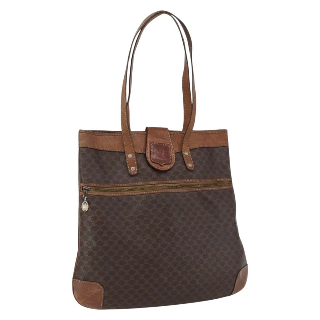 Celine Macadam Brown PVC Tote with Leather Trim and Gold Accents: Celine Macadam Brown PVC Tote with Leather Trim and Gold Accents This CELINE tote bag features the classic Macadam canvas with brown and gold PVC leather accents. The spacious design is crafted in Ita