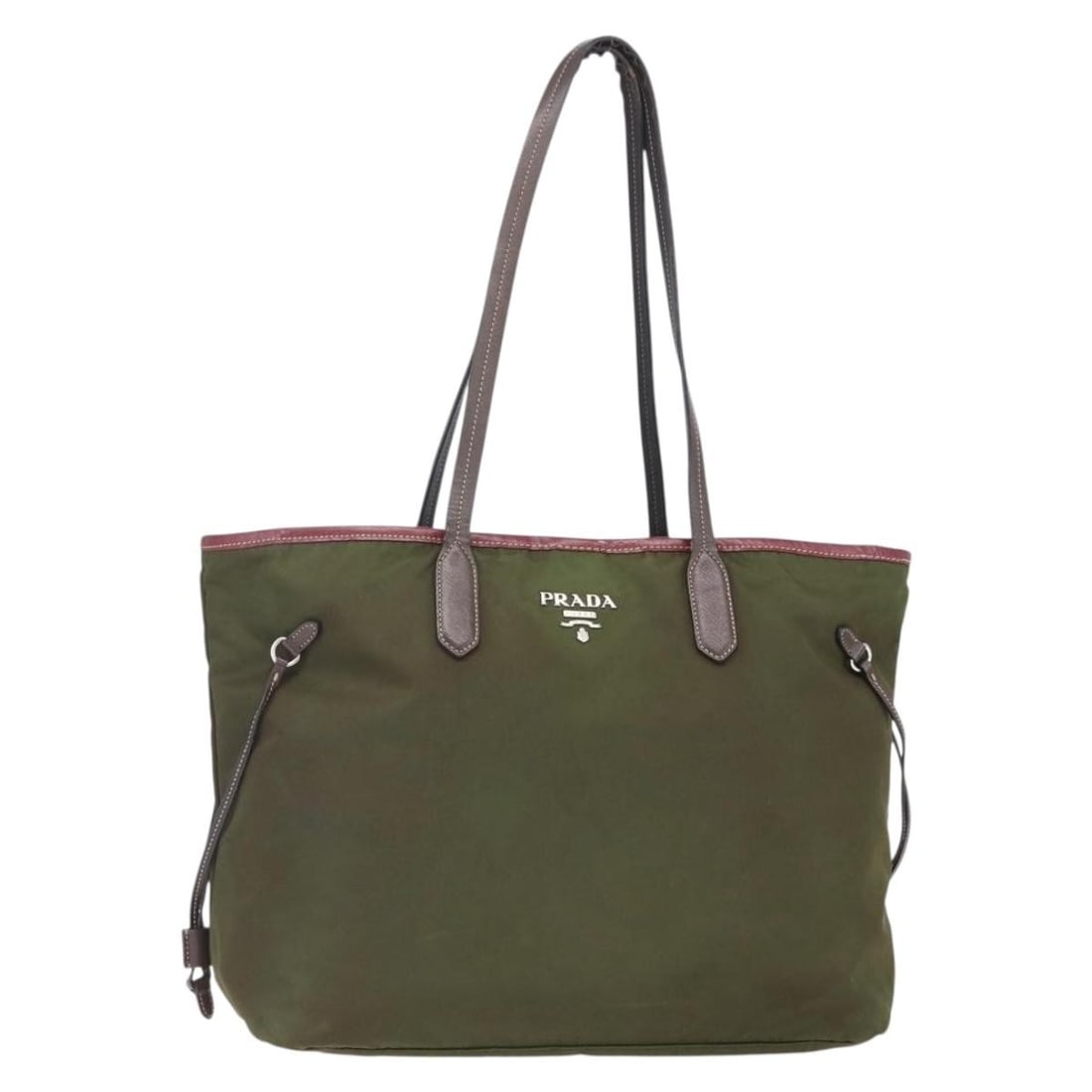 PRADA Khaki Silver Nylon Tote Bag Authentic Italy 150572: PRADA Khaki Silver Nylon Tote Bag Authentic Italy 150572 This PRADA Tote Bag is a stylish and functional accessory crafted from durable nylon. The exterior features a sophisticated khaki and silver co