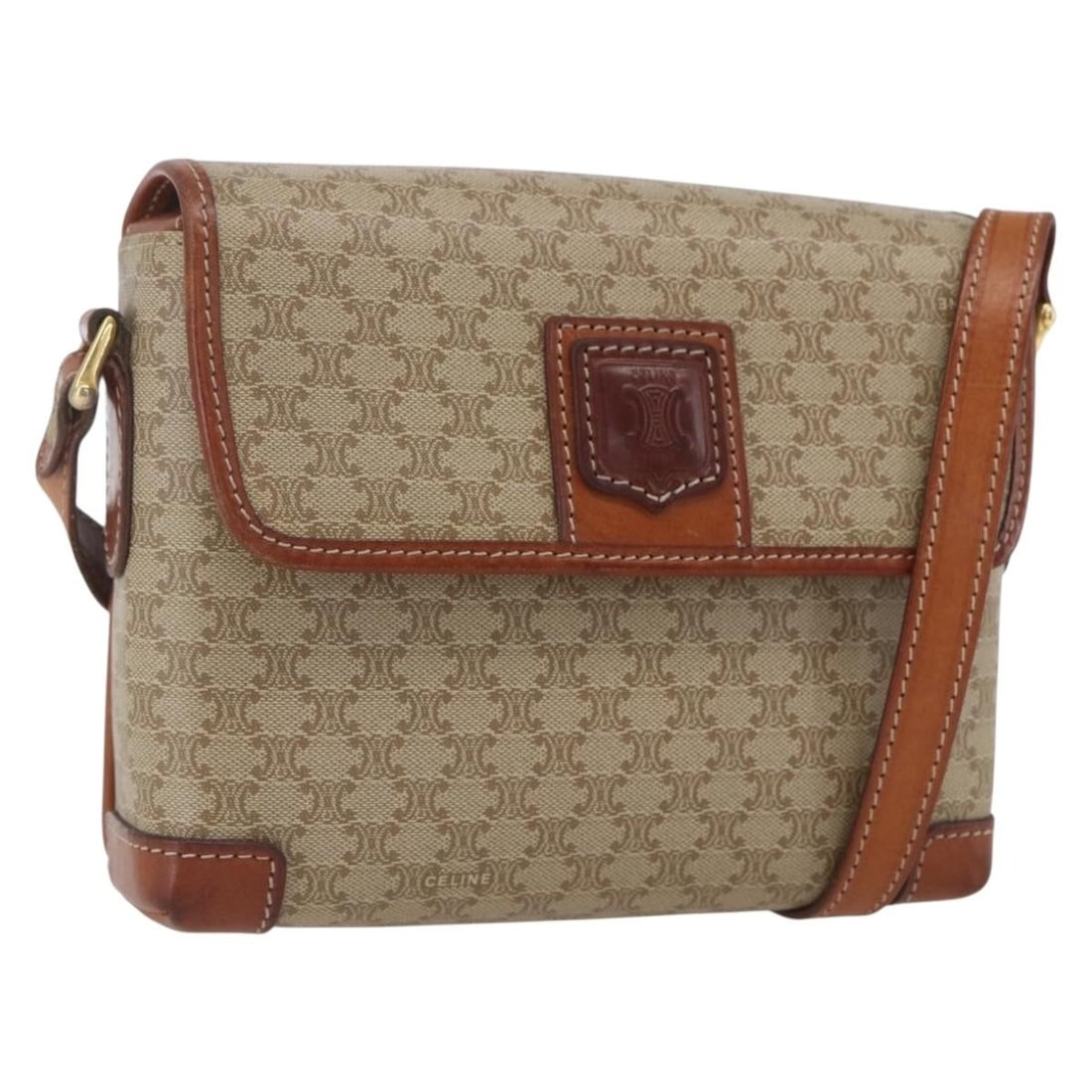 Celine Beige Macadam PVC Leather Shoulder Bag Gold Details Italy: Celine Beige Macadam PVC Leather Shoulder Bag Gold Details Italy This CELINE Macadam shoulder bag features a beige and gold PVC leather and canvas exterior with signature Macadam pattern. It includes