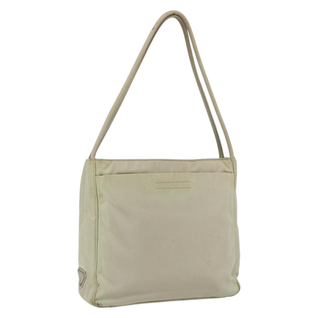 Prada Ivory Nylon Tote With Silver Accents and Guarantee Card: Prada Ivory Nylon Tote With Silver Accents and Guarantee Card This Prada tote bag features an ivory and silver color scheme and is crafted from nylon. It has a practical design with a top handle and i