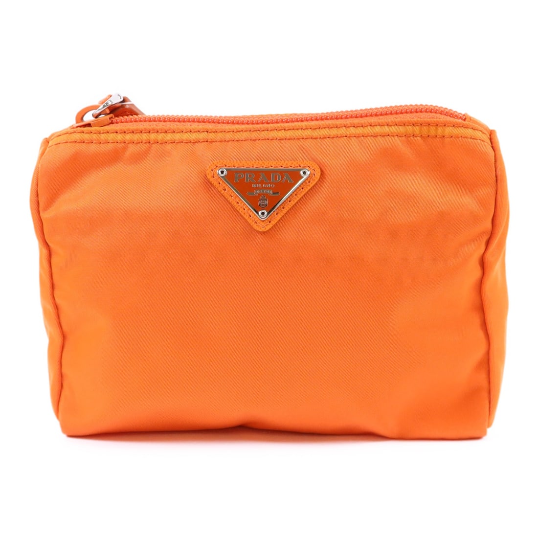 Prada Orange Nylon Pouch with Silver Tone Hardware: Prada Orange Nylon Pouch with Silver Tone Hardware This Prada pouch features durable orange nylon with a sleek silhouette. The bag is crafted with silver-tone hardware and is made in Italy, offering b