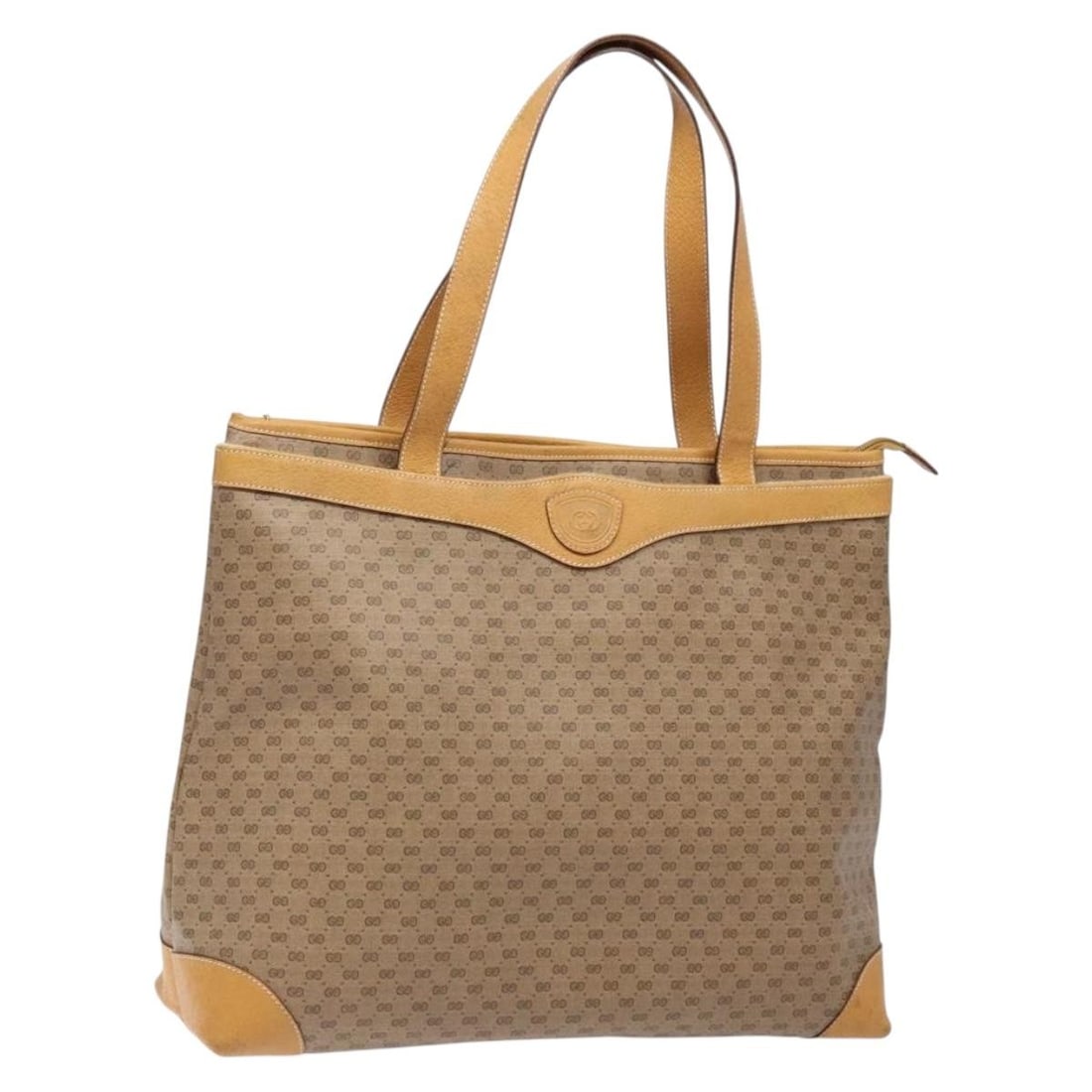 GUCCI Micro GG Supreme Beige Gold PVC Tote Bag Italy: GUCCI Micro GG Supreme Beige Gold PVC Tote Bag Italy This authentic GUCCI Micro GG Supreme Tote Bag is a stylish accessory crafted from high-quality PVC leather and micro small GG canvas. The elegant