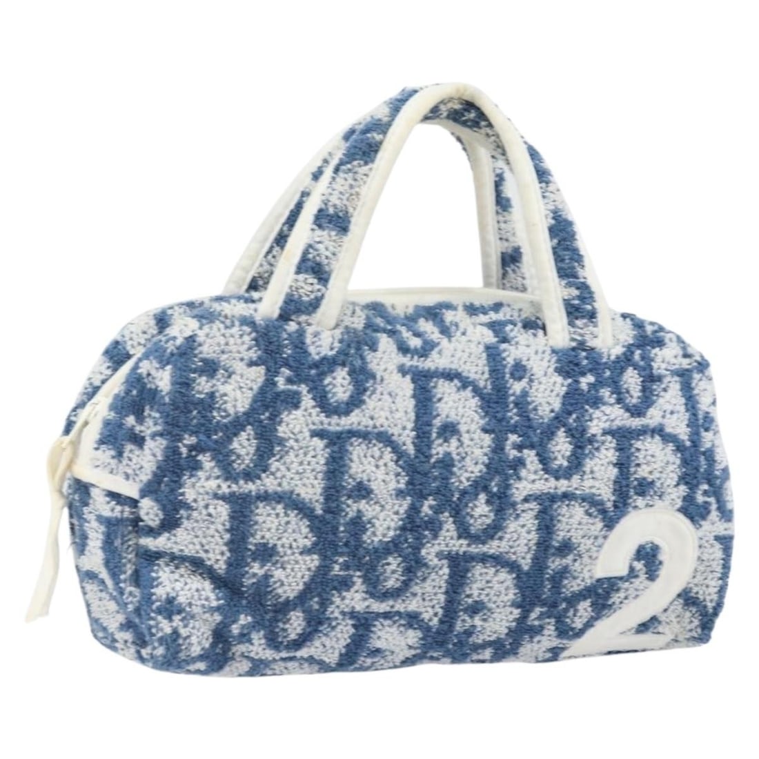 Dior Blue Pile and Trotter Canvas Handbag from France: Dior Blue Pile and Trotter Canvas Handbag from France This Christian Dior Trotter Canvas handbag features blue pile and Trotter canvas exterior, crafted in France. The handbag has a compact size with