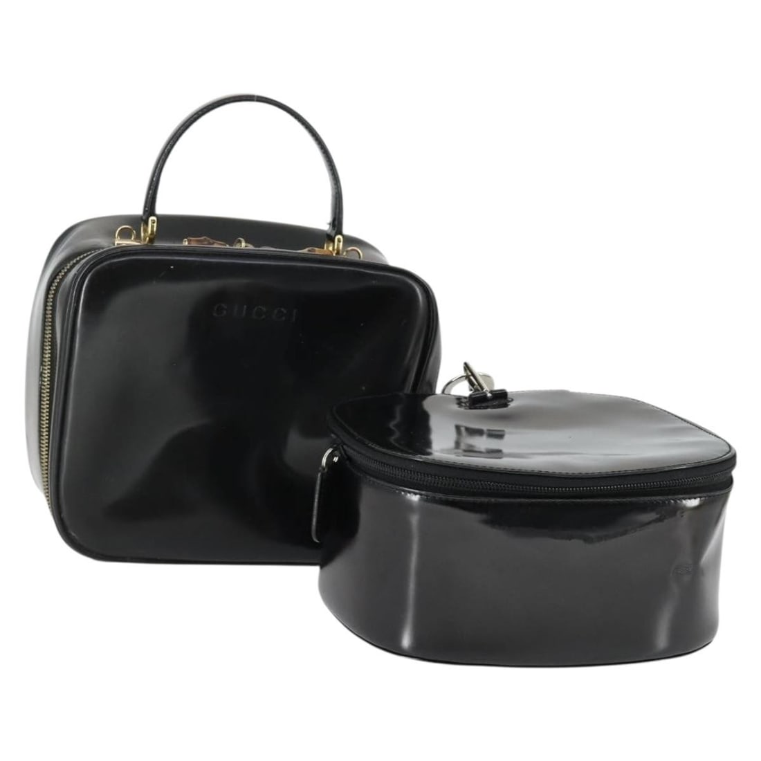 Set of 2 Gucci Bamboo Black Patent Leather Vanity Pouches: Set of 2 Gucci Bamboo Black Patent Leather Vanity Pouches This is a set of two GUCCI Bamboo Vanity pouch bags crafted from black patent leather. The set is made in Italy and features bamboo accents, w
