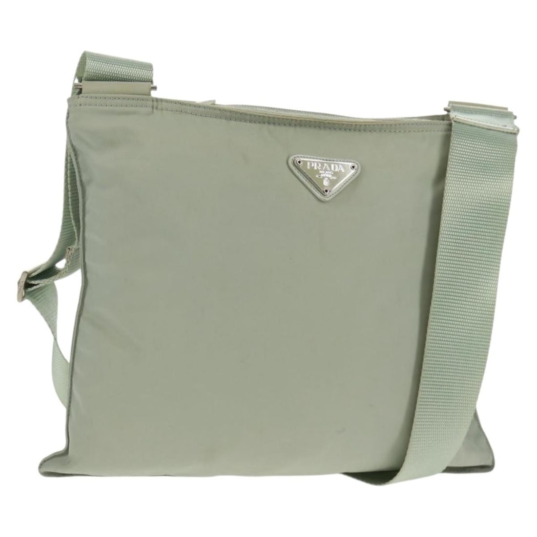 Gray Nylon Prada Shoulder Bag with Adjustable Strap: Gray Nylon Prada Shoulder Bag with Adjustable Strap This is a gray nylon shoulder bag crafted in Italy. The bag features an adjustable shoulder strap and is designed for practical use. Please note the