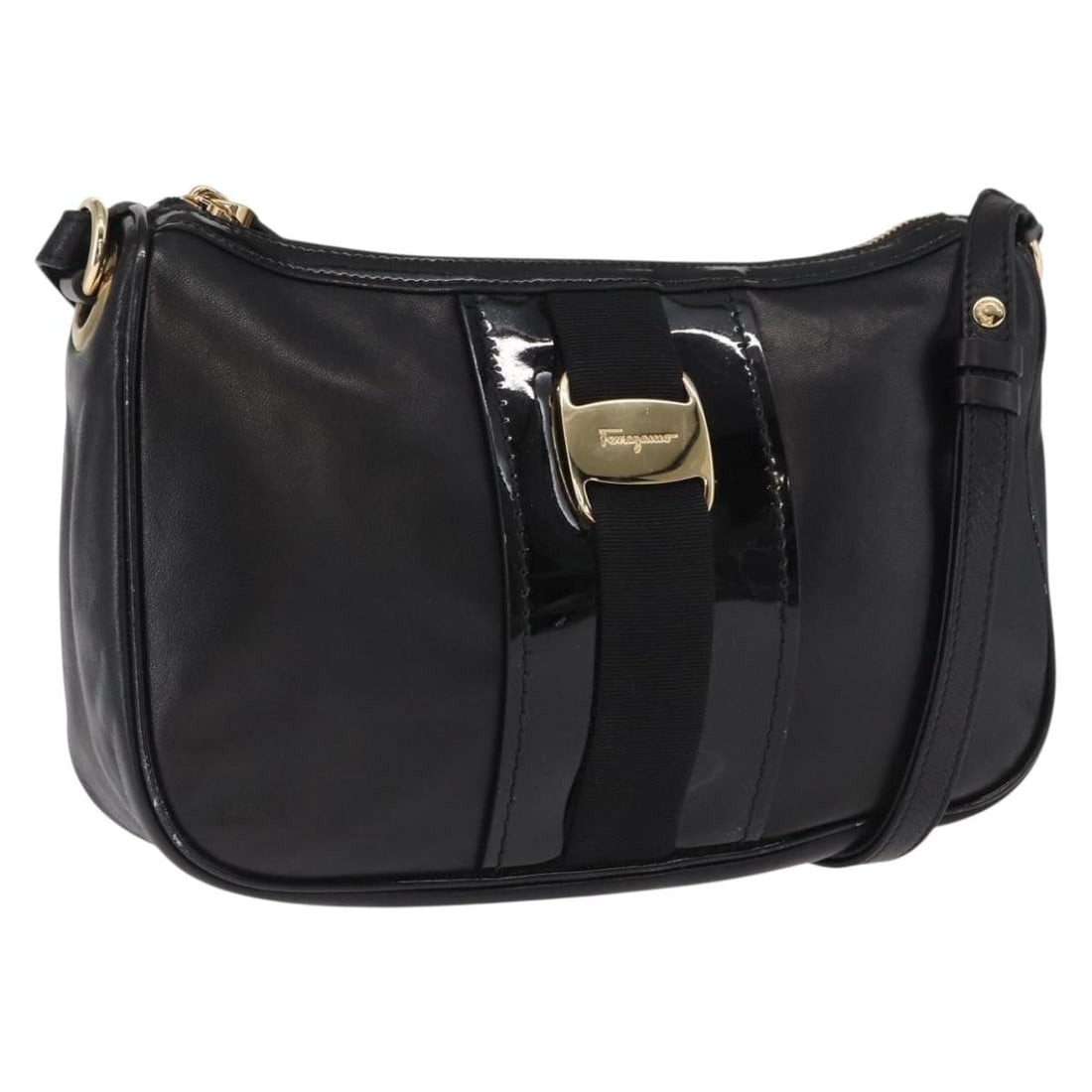 Black Leather Vala Shoulder Bag by Salvatore Ferragamo Gold Accents: Black Leather Vala Shoulder Bag by Salvatore Ferragamo Gold Accents This Salvatore Ferragamo Vala shoulder bag features black leather with gold-tone accents. Made in Italy, the bag includes a structur