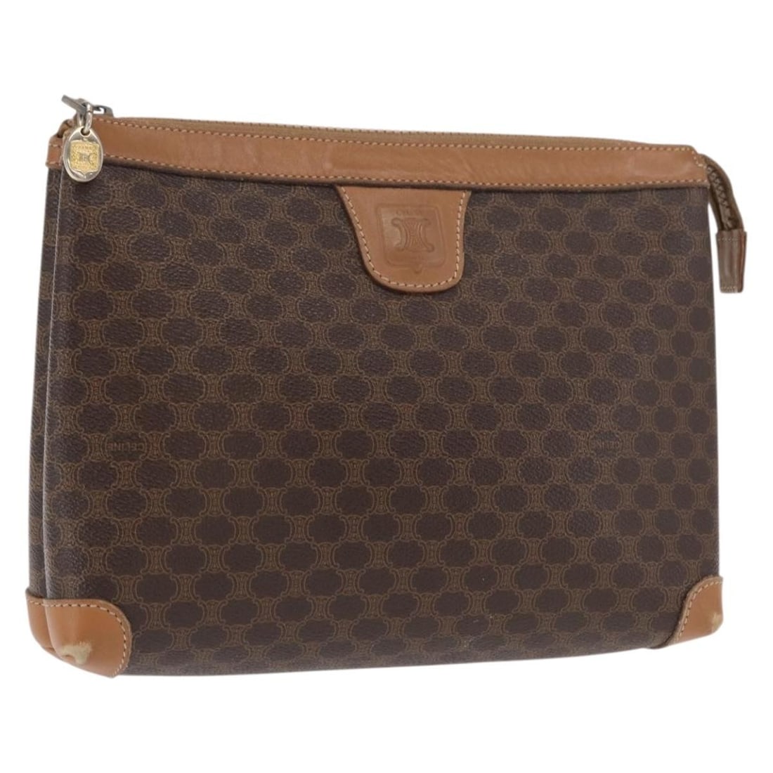 Brown Macadam Canvas Clutch by CELINE with PVC Leather Gold Accents: Brown Macadam Canvas Clutch by CELINE with PVC Leather Gold Accents This Celine Macadam clutch bag features a classic brown and gold colorway and is crafted from durable PVC leather and the signature