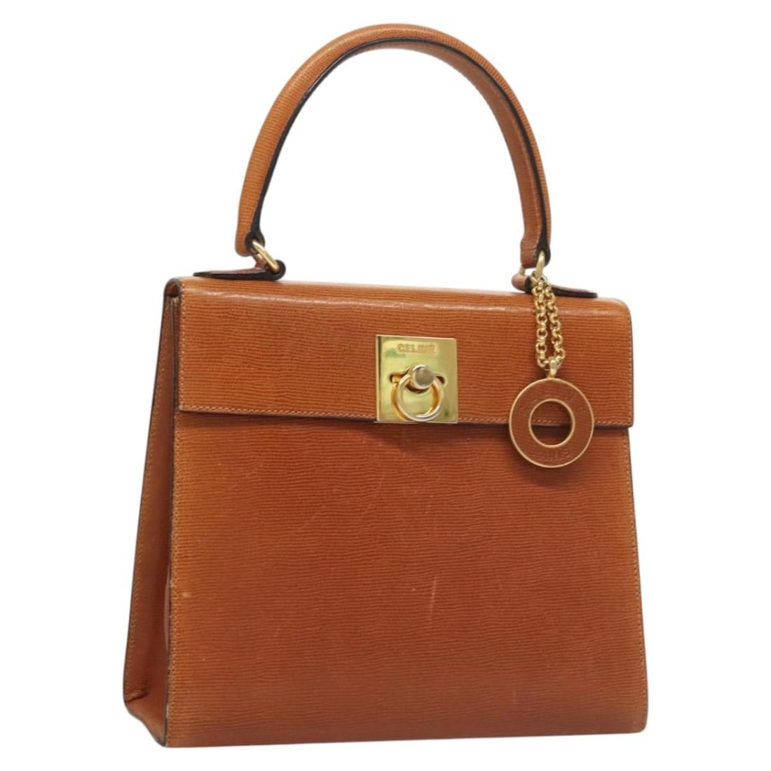CELINE Brown Gold Leather Handbag Made in Italy: CELINE Brown Gold Leather Handbag Made in Italy This authentic CELINE hand bag is crafted from high-quality leather in a stylish brown and gold color combination. Designed for both elegance and functi