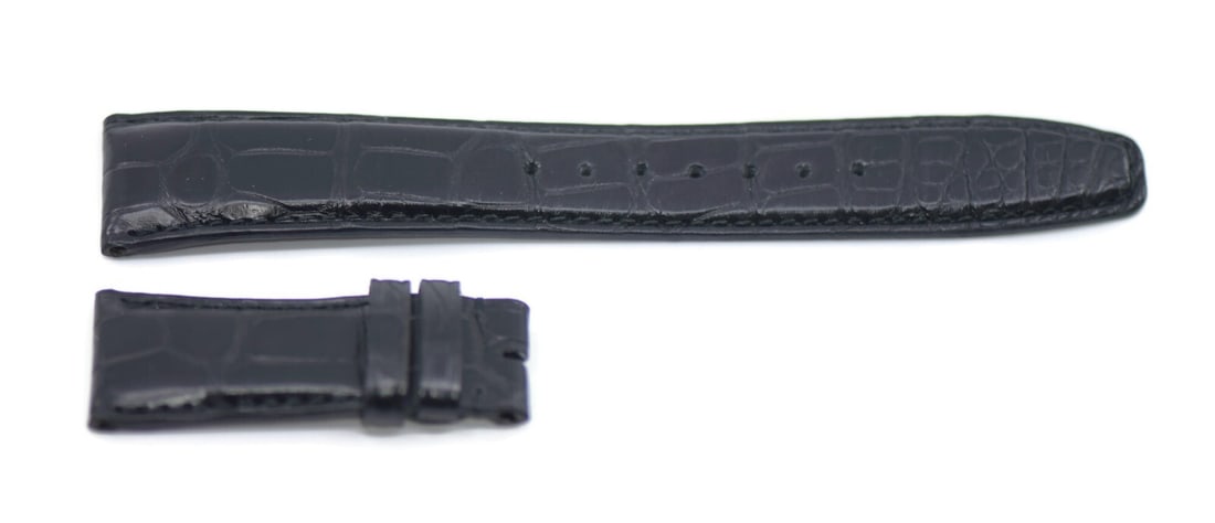 IWC Authentic Black Leather Watch Strap 22x18mm: IWC Authentic Black Leather Watch Strap 22x18mm Enhance your watch with this authentic IWC Black Leather Strap. Designed specifically for wristwatches, this strap features a sleek black color and a wi