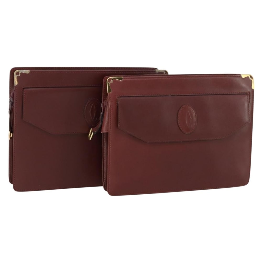 Set of 2 Cartier Bordeaux Leather Clutch Bags with Guarantee Card: Set of 2 Cartier Bordeaux Leather Clutch Bags with Guarantee Card This is a set of two Cartier Must Line clutch bags crafted from Bordeaux leather. Made in France, both bags are designed in a classic