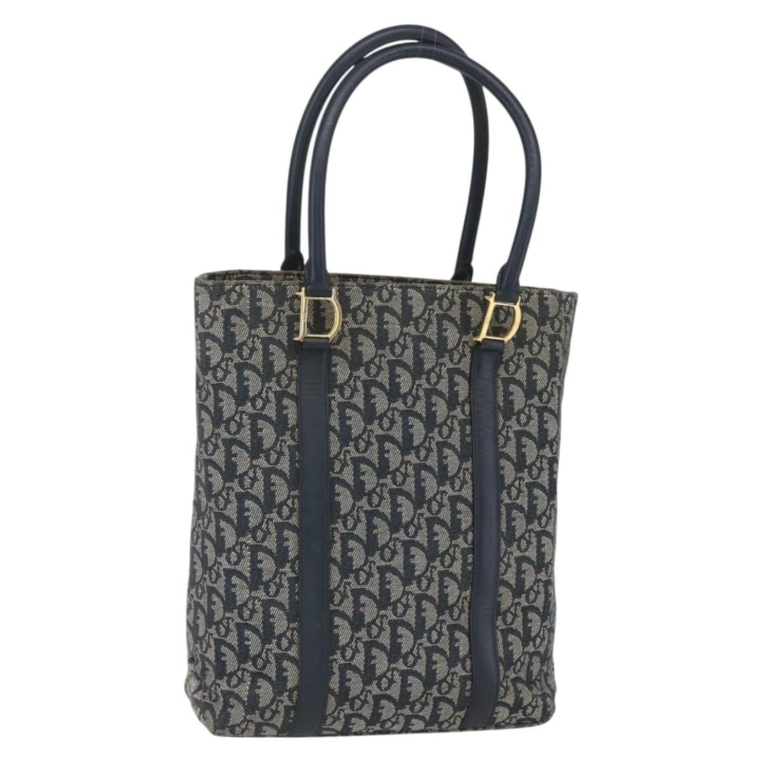 Navy and Gold Trotter Canvas Tote by Christian Dior: Navy and Gold Trotter Canvas Tote by Christian Dior This Christian Dior tote bag features the classic Trotter canvas in navy and gold tones. The bag is crafted in Italy and offers a spacious interior,