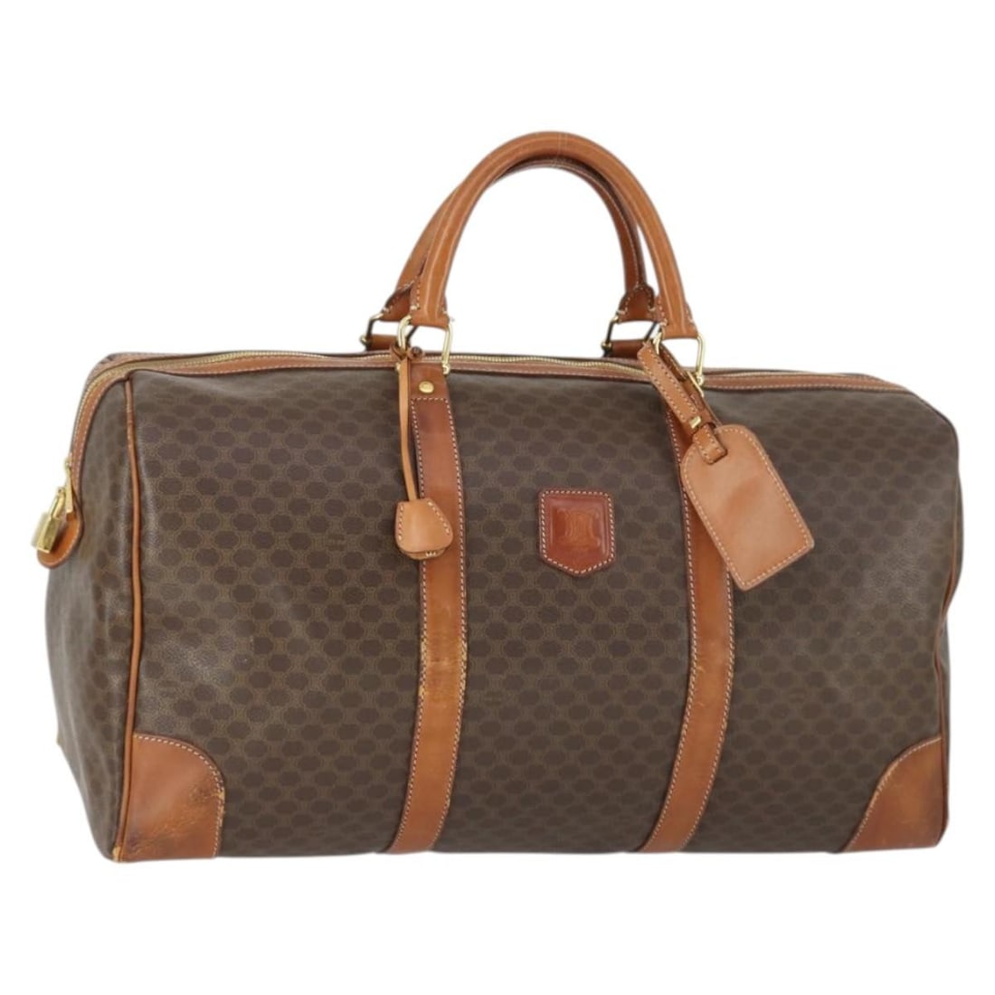 Celine Boston Bag Macadam Canvas PVC Leather Brown Gold with Padlock and Key: Celine Boston Bag Macadam Canvas PVC Leather Brown Gold with Padlock and Key This CELINE Boston Bag features the signature Macadam canvas with brown and gold PVC leather accents. The spacious design o