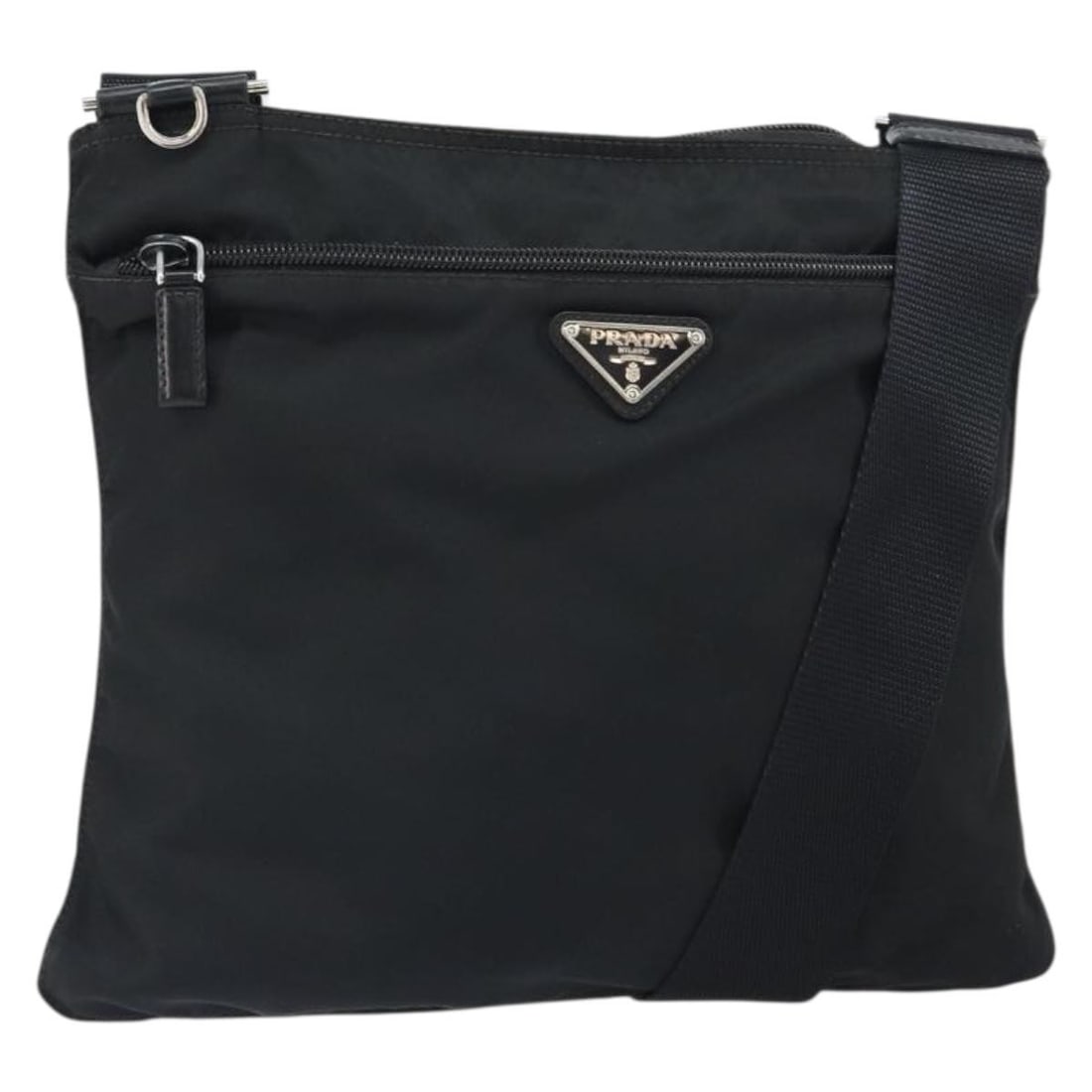 Prada Black Nylon Shoulder Bag with Silver Details Made in Italy: Prada Black Nylon Shoulder Bag with Silver Details Made in Italy This PRADA shoulder bag features a black nylon exterior with silver-tone details. Made in Italy, it offers a practical design with an a