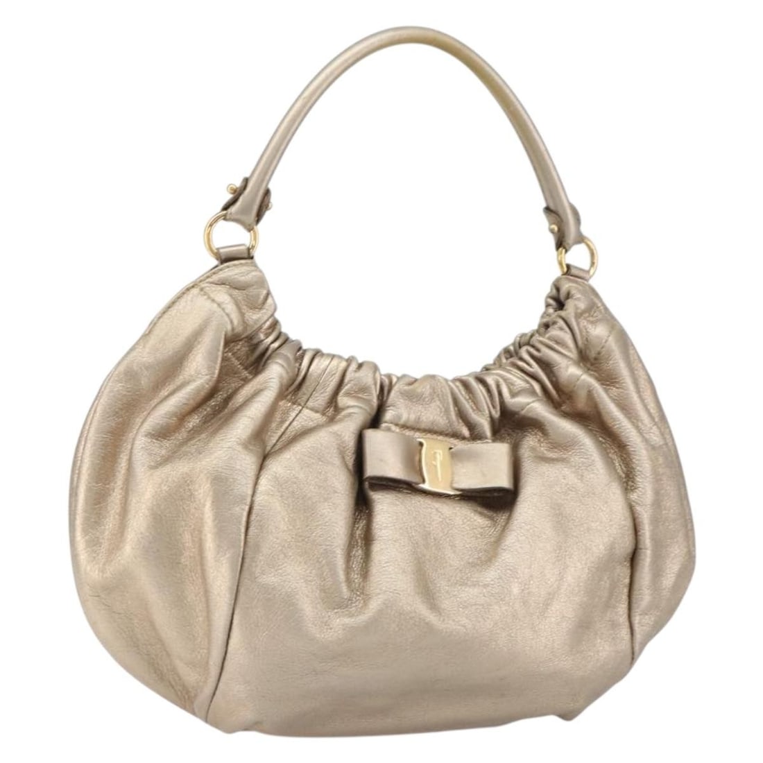 Gold Leather Vala Handbag by Salvatore Ferragamo Italy: Gold Leather Vala Handbag by Salvatore Ferragamo Italy This Salvatore Ferragamo Vala handbag features a gold leather exterior and is crafted in Italy. It offers a structured design with top handles an