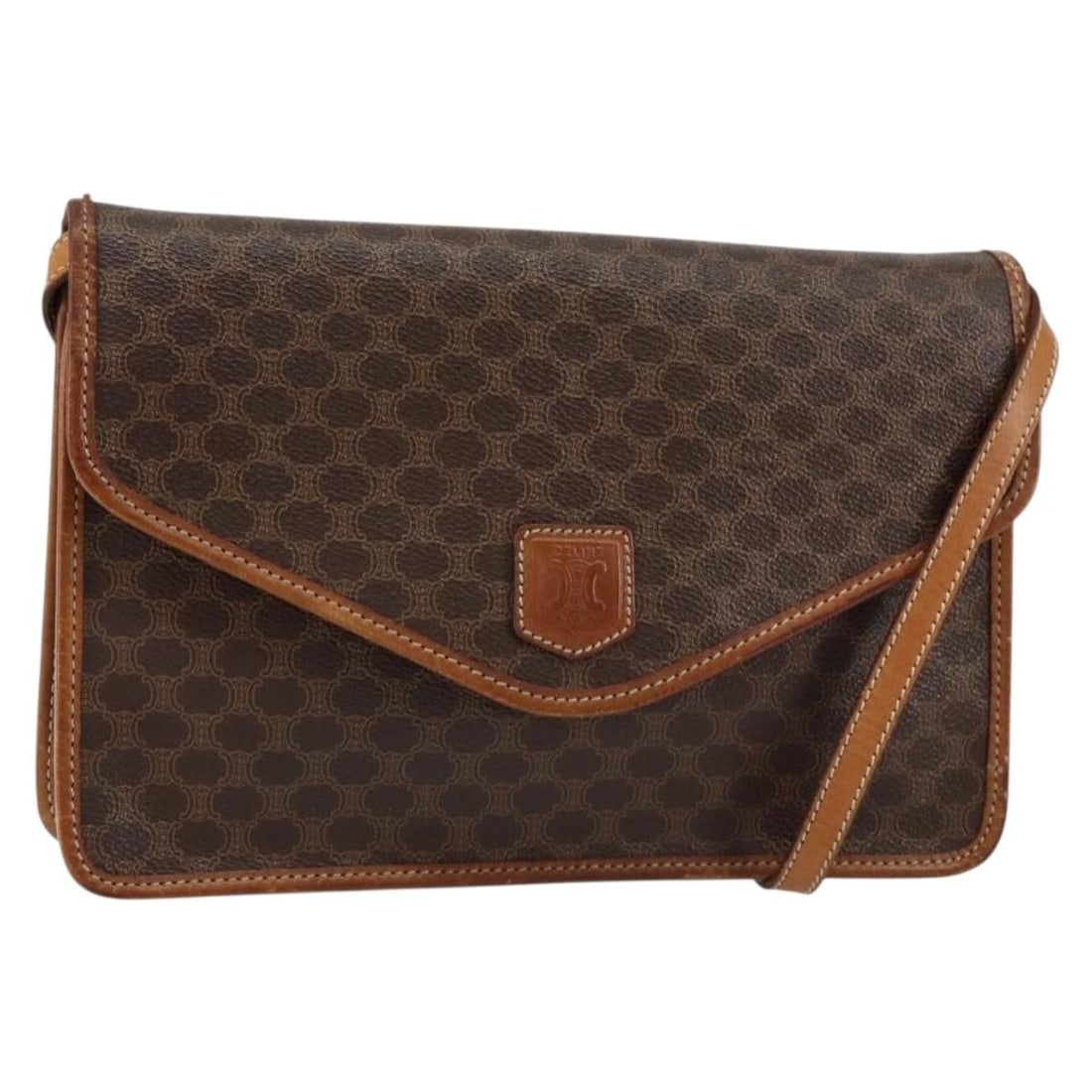 CELINE Macadam Beige Gold PVC Leather Shoulder Bag Italy: CELINE Macadam Beige Gold PVC Leather Shoulder Bag Italy This elegant Celine Macadam Canvas Shoulder Bag is crafted from durable PVC leather in a chic beige and gold color combination. It features a s