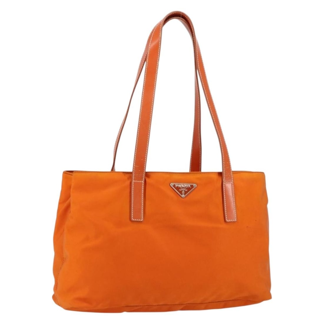 PRADA Orange Silver Nylon Tote Bag Italy Authentic 155228: PRADA Orange Silver Nylon Tote Bag Italy Authentic 155228 This authentic PRADA tote bag is crafted from durable nylon in a vibrant orange and silver color combination. Designed in Italy, it features a