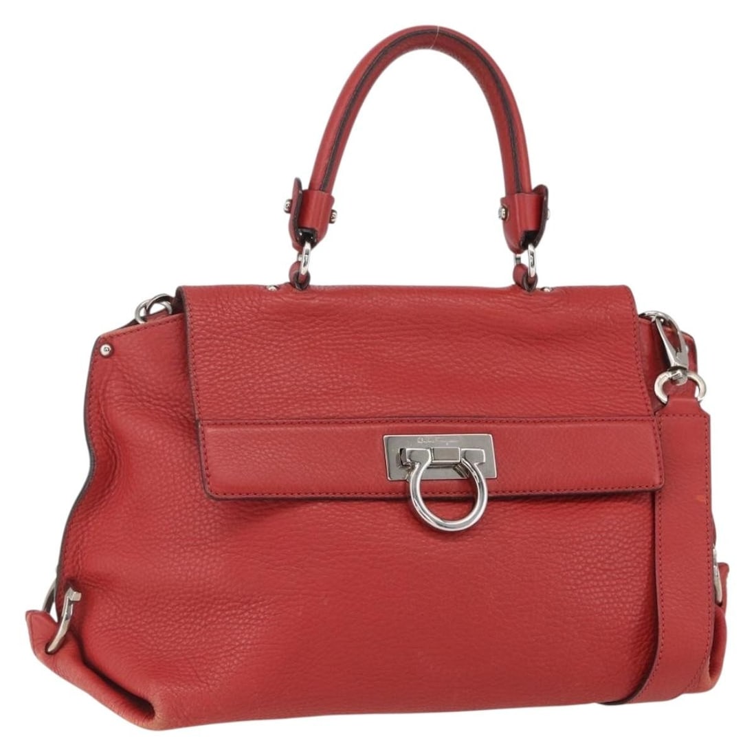 Salvatore Ferragamo Red Leather Gancini 2-Way Hand Bag with Silver Accents: Salvatore Ferragamo Red Leather Gancini 2-Way Hand Bag with Silver Accents This stylish Salvatore Ferragamo Gancini Hand Bag showcases a luxurious leather exterior in a striking red and silver color c