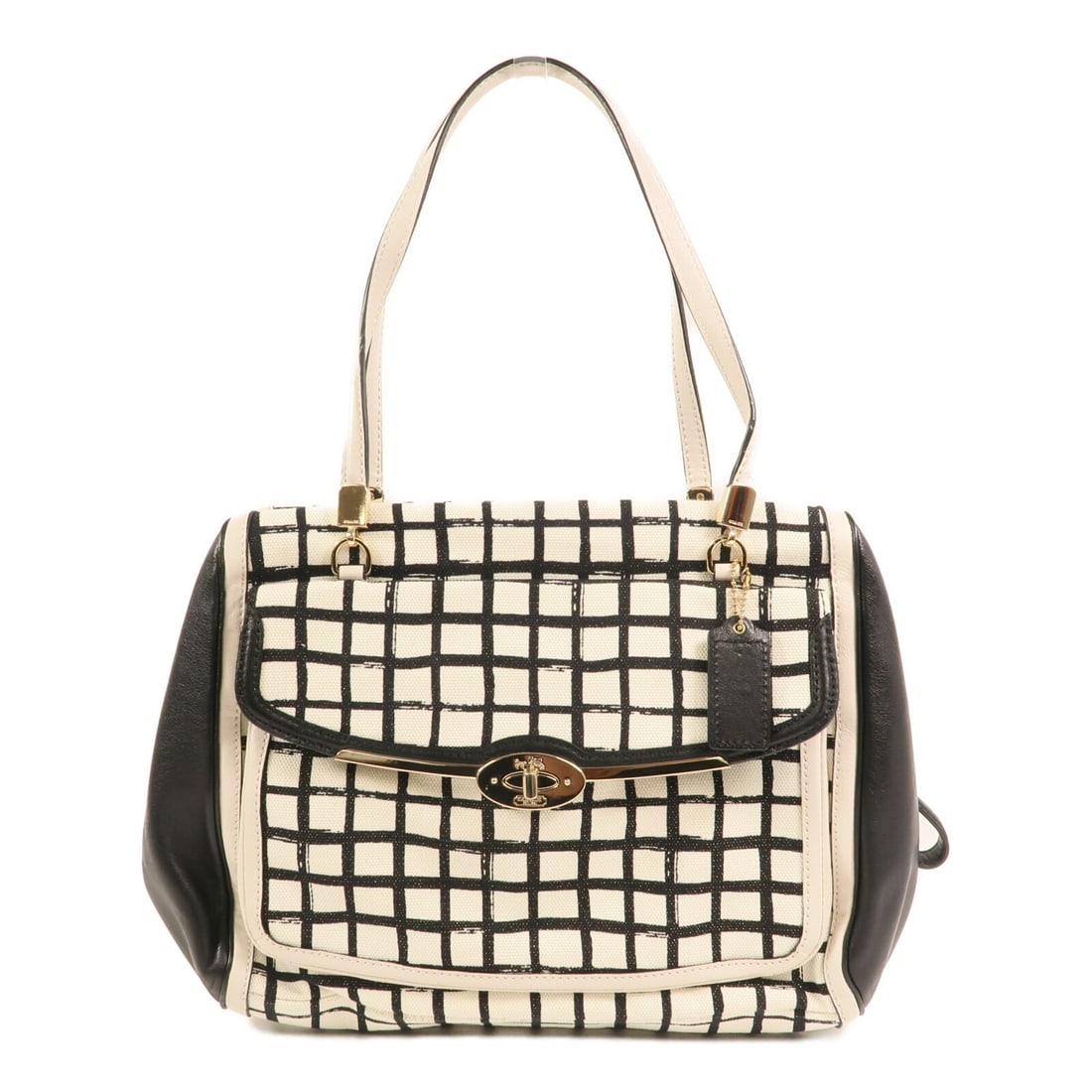 COACH Canvas Shoulder Bag White Black Gold Hardware Style 28082: COACH Canvas Shoulder Bag White Black Gold Hardware Style 28082 This COACH shoulder bag features a sleek white and black canvas exterior, designed for everyday use. The bag is crafted with attention t